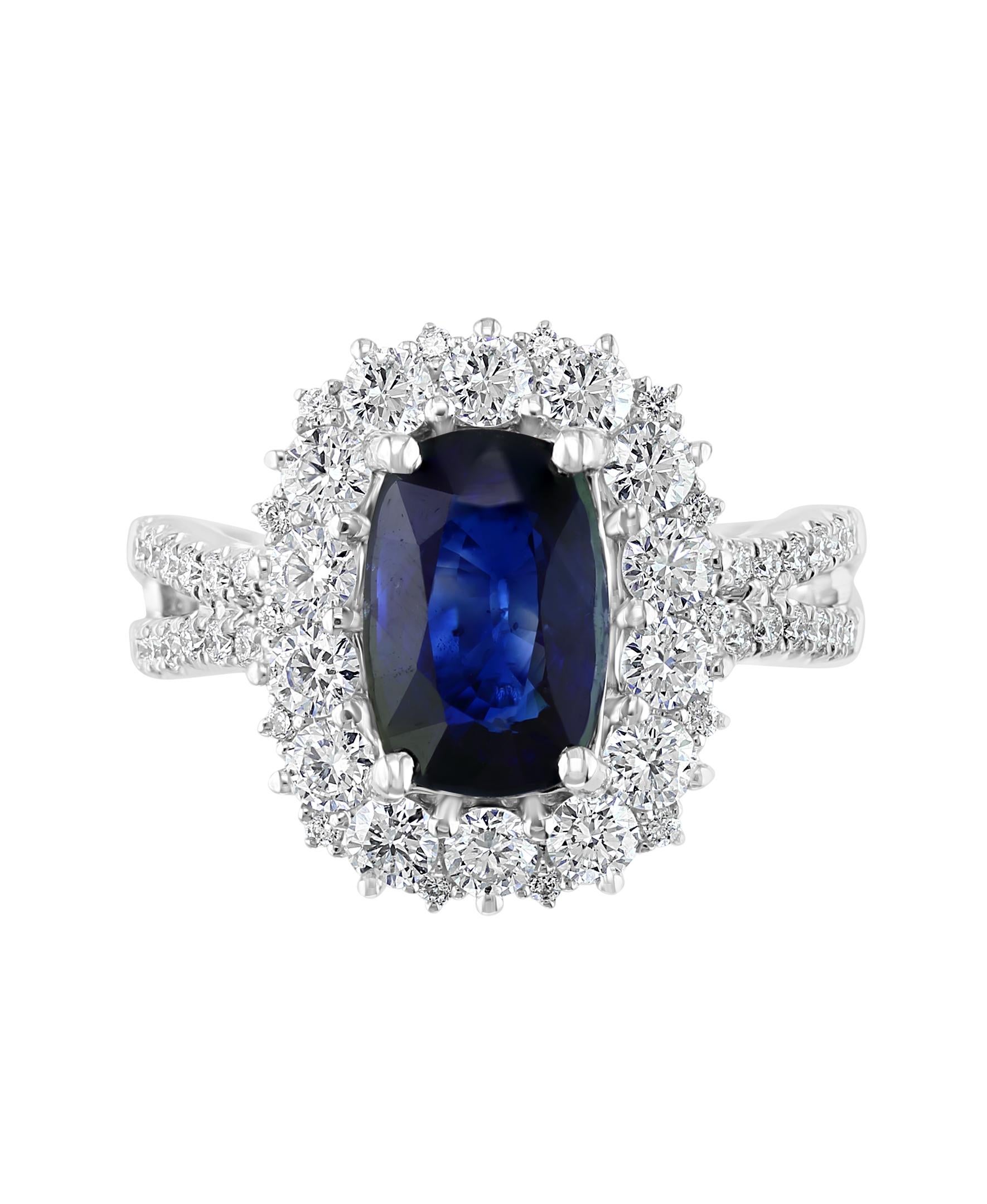 This Effy Hematian design ring is set in 18K White gold. Featuring for the center stone a Cushion shape Sapphire with a weight of 3.01 ct.
Surrounded by round cut Diamonds weighing 1.38 ct..
The ring is a size 7. The item number is 17427.