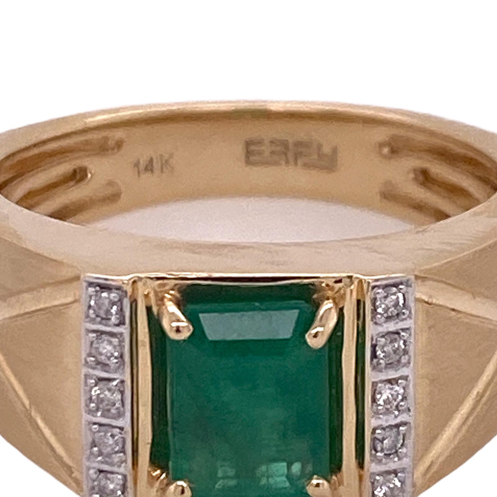 Effy men's emerald diamond ring fashioned in 14 karat yellow gold. The emerald cut emerald weighs approximately 2.00 carats,and the surrounding 10 round brilliant cut diamonds weigh approximately .10 carat total weight. The ring is currently size