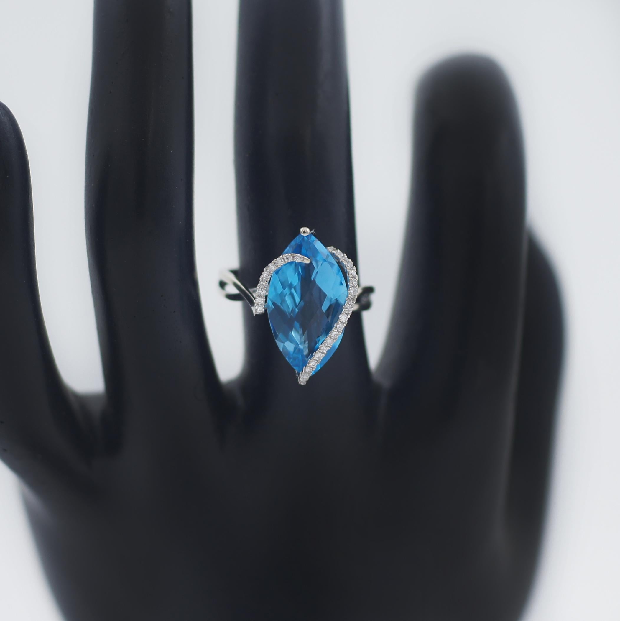 EFFY
Define your style with elegance in this extraordinary marquise-shape blue topaz (Approx. 7-1/10 ct. t.w.)
ring designed by EFFY®
featuring round-shape diamond (Approx. 1/8 ct. t.w.) ribbon accents
Set in 14k white gold
Ring Size 7.5
In great