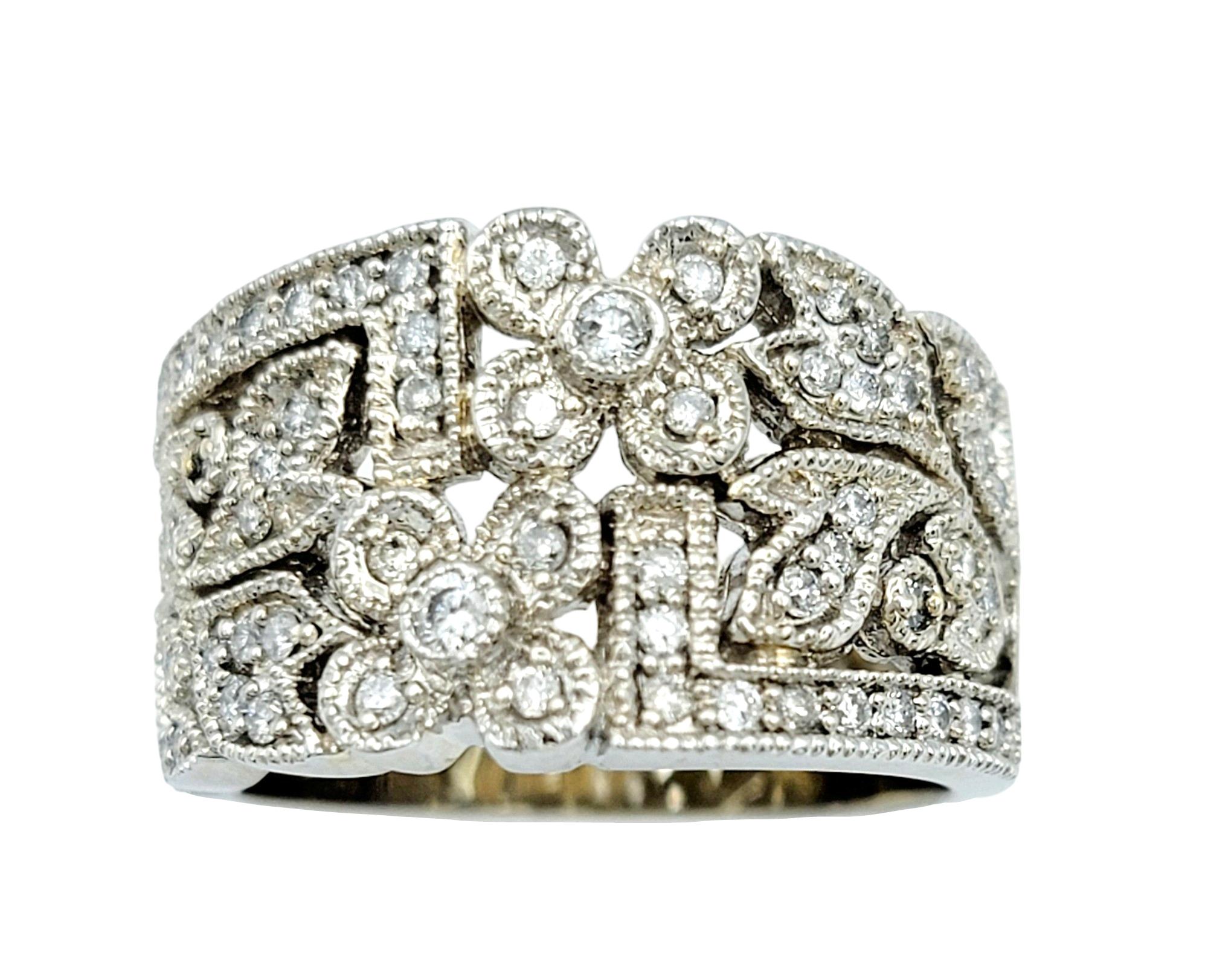 Ring Size: 7.25

The Effy band ring, crafted in elegant 14 karat white gold, features a captivating design inspired by nature's beauty. Adorned with a delicate arrangement of flowers and leaves, this ring exudes timeless charm and sophistication.