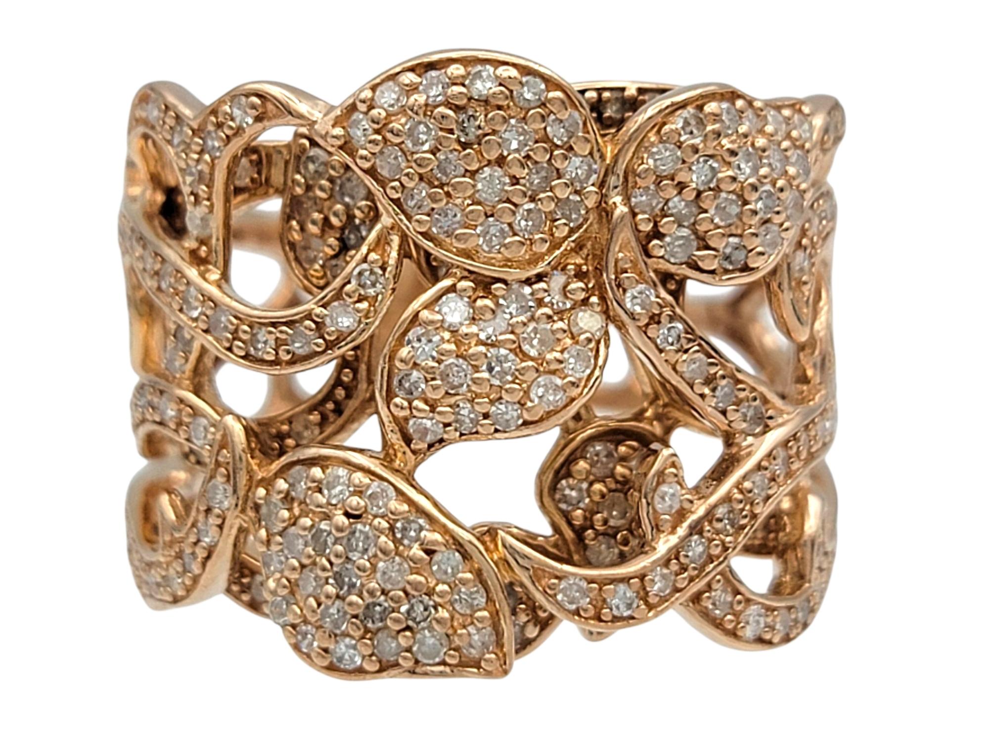 Ring Size: 7

This bold Effy diamond ring features an openwork filigree design formed by a lattice of heart and petal-shaped motifs. The intricate pattern is paved with round brilliant cut diamonds, adding texture and dimension throughout the
