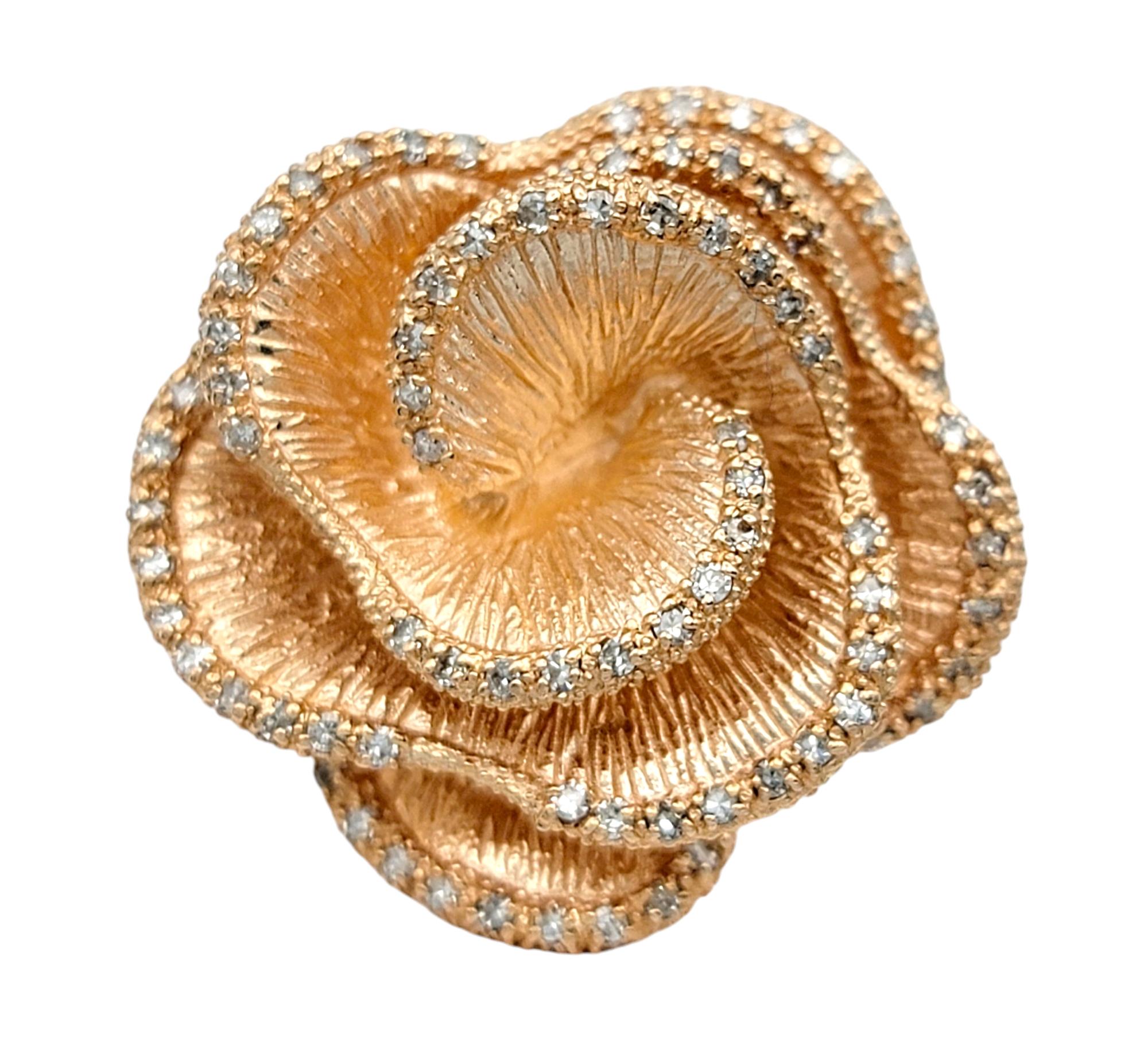 Ring Size: 7.25

Make a bold statement with this enchanting Effy cocktail ring, exquisitely crafted in 14 karat rose gold. Designed to captivate, this ring features a stunning floral motif, where each delicate petal is outlined with a shimmering row