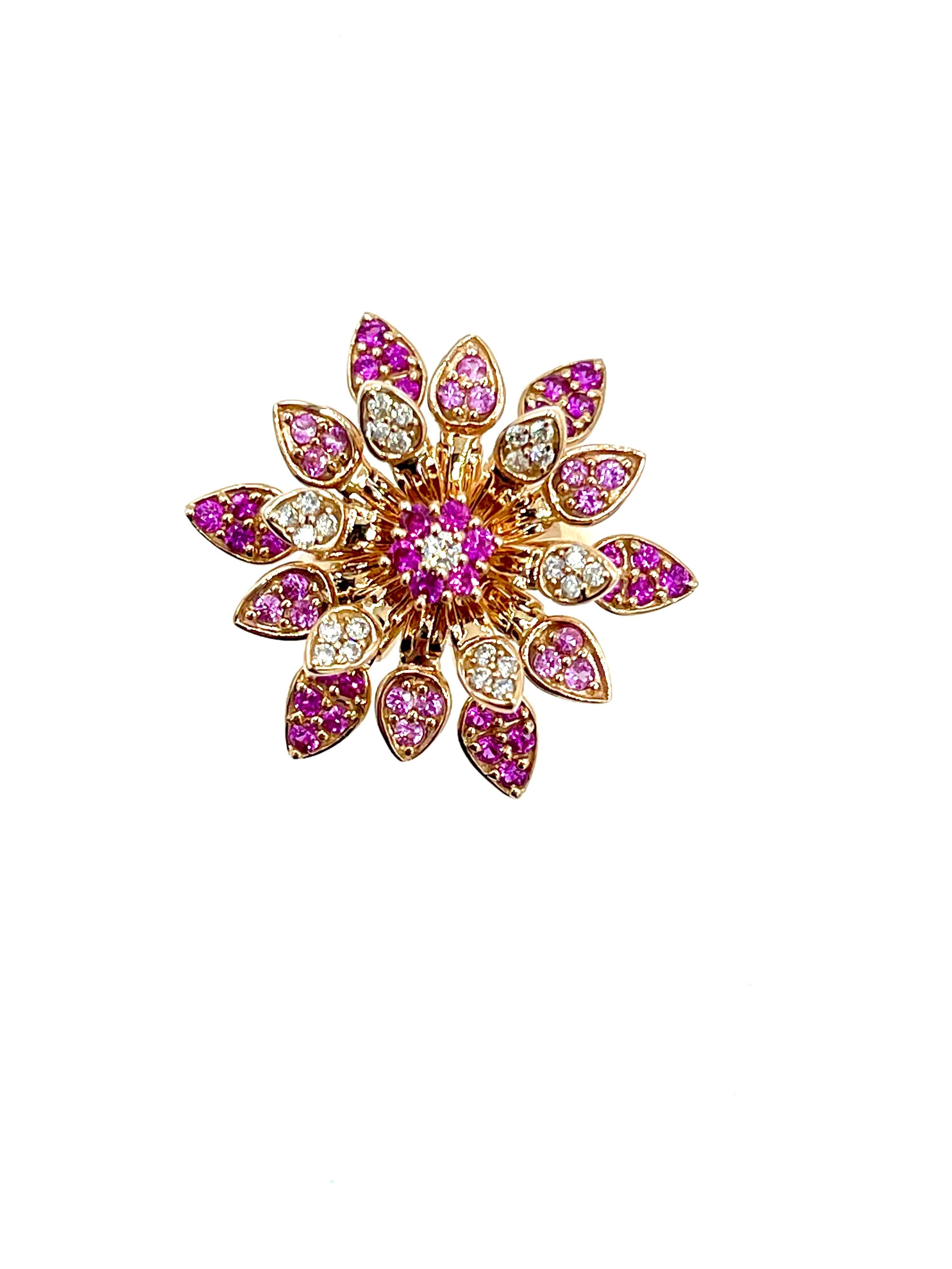 An Effy designed creative cocktail ring.  The ring is deigned as a blooming flower, set with Pink Sapphires and Diamonds in the petals.  There are a total of 1.00 carat in round Pink Sapphires, and 0.26 carats in round brilliant Diamonds.  The
