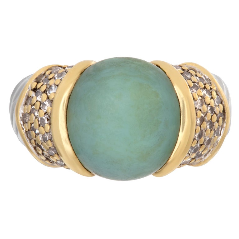 Effy ring in 925 sterling silver, 18k yellow gold and diamond accents with green center stone. Size 6.This David Yurman ring is currently size 6 and some items can be sized up or down, please ask! It weighs 0 gramms and is 18K & STERLING SILVER.
