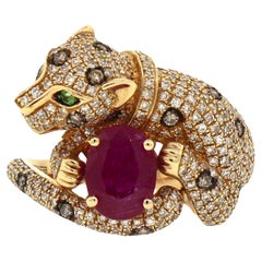Ring mit Panther-Rubin, Diamant und Smaragd in Effy-Schliff