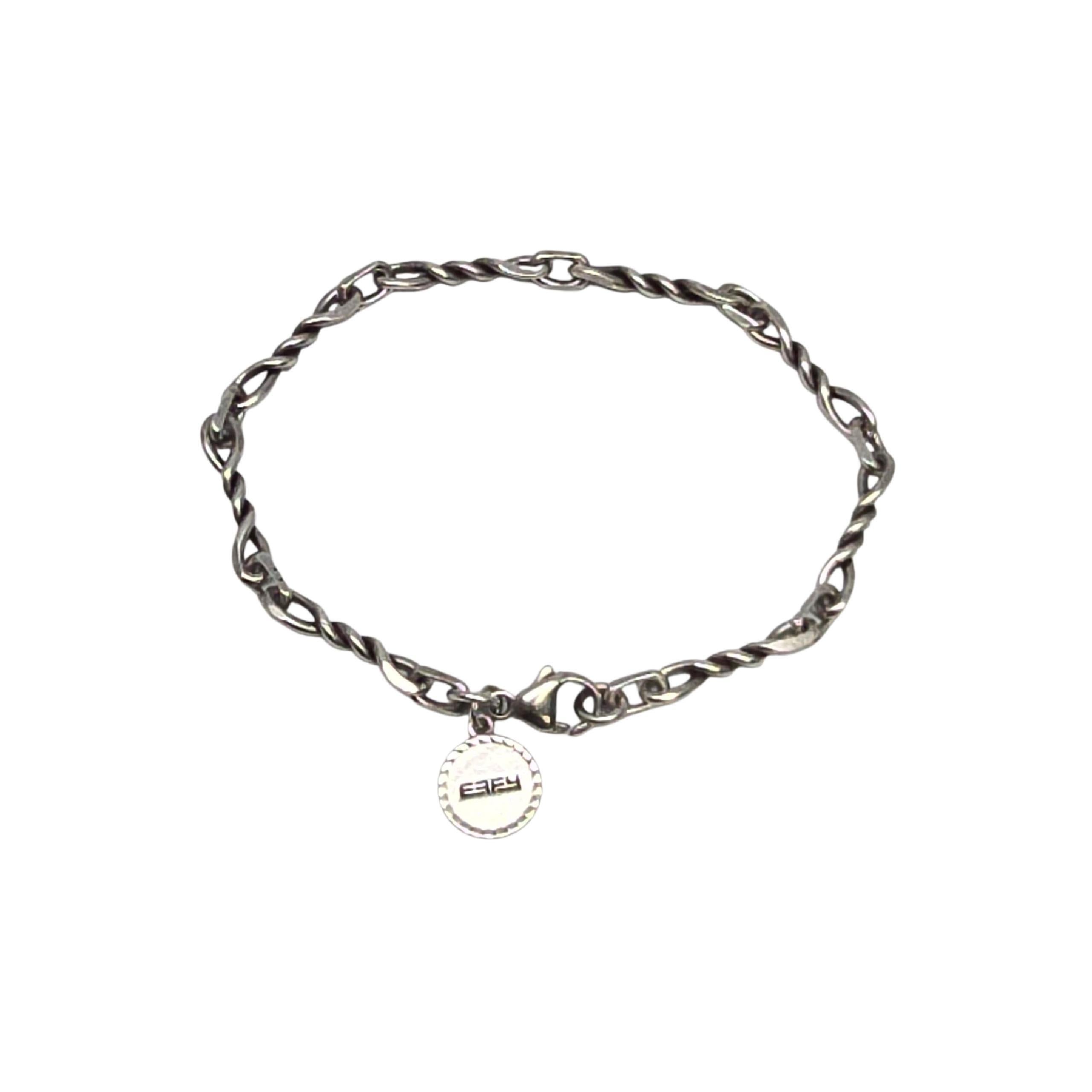 Pulsera de eslabones retorcidos de plata de ley para hombre de Effy

Una auténtica pulsera Effy con eslabón giratorio y etiqueta colgante de leopardo.

Pesa aproximadamente 11,4 g, 7,3 dwt

Mide aprox. 7 3/4