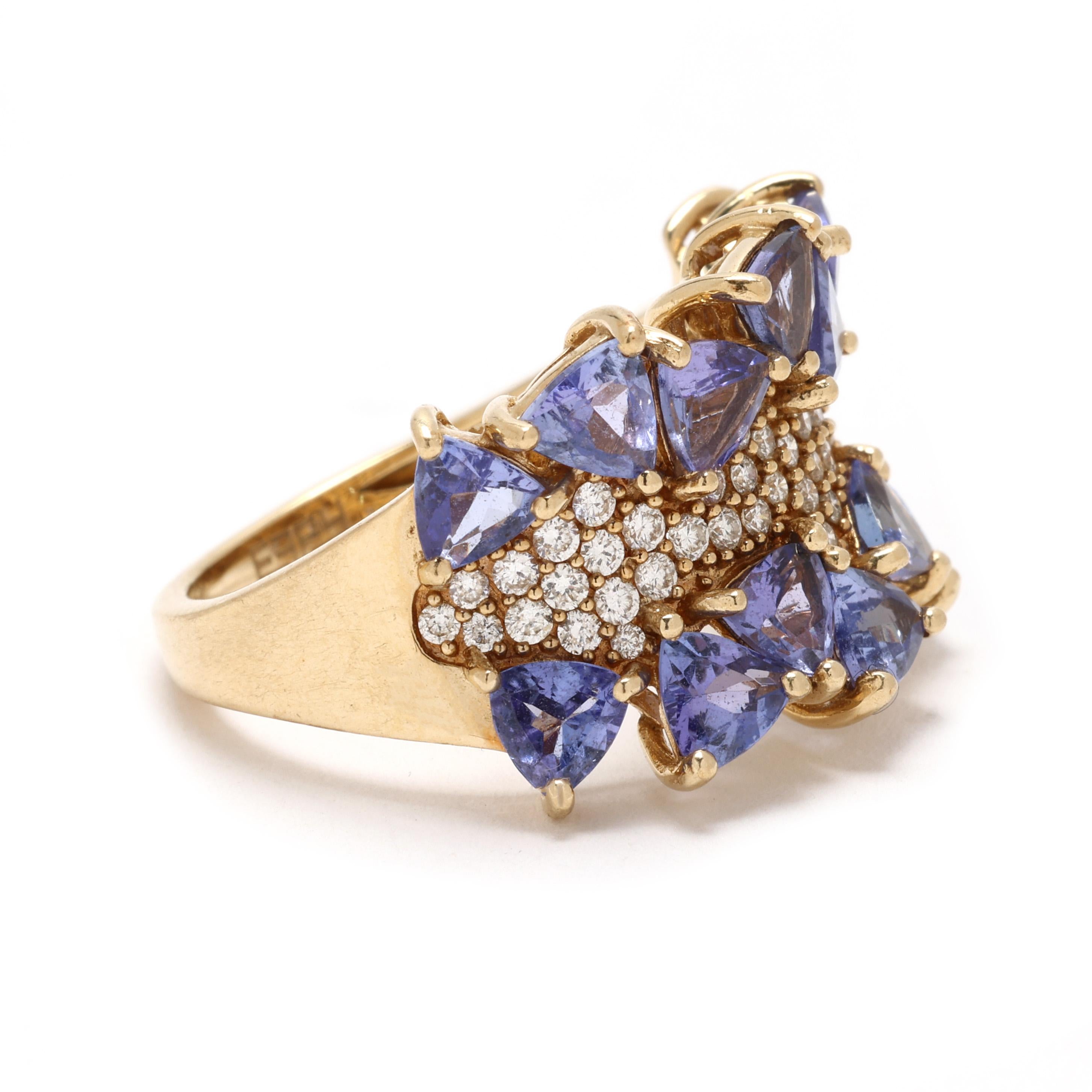 Make a bold statement with this stunning Effy tanzanite and diamond ring, beautifully crafted in 14k yellow gold. Featuring a mesmerizing violet-blue tanzanite surrounded by sparkling diamonds, this luxurious ring is a true showstopper that exudes