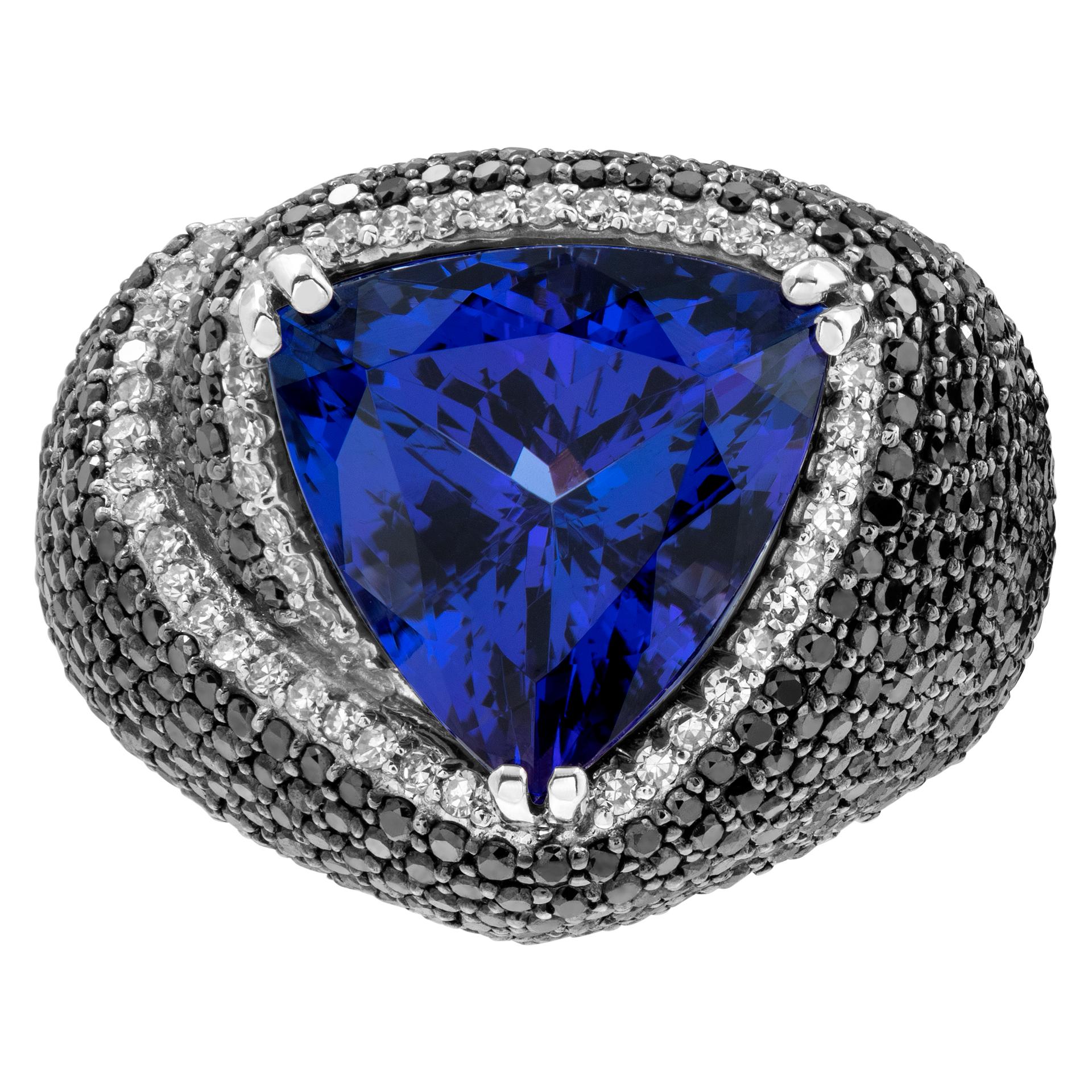 Effy Trillion cut 7.73 ct tanzanite ring in 14k white gold with 2.3 cts in pave black & white diamonds. Ring size 7. Comes with Effy box.This tanzanite/diamond ring is currently size 7 and some items can be sized up or down, please ask! It weighs