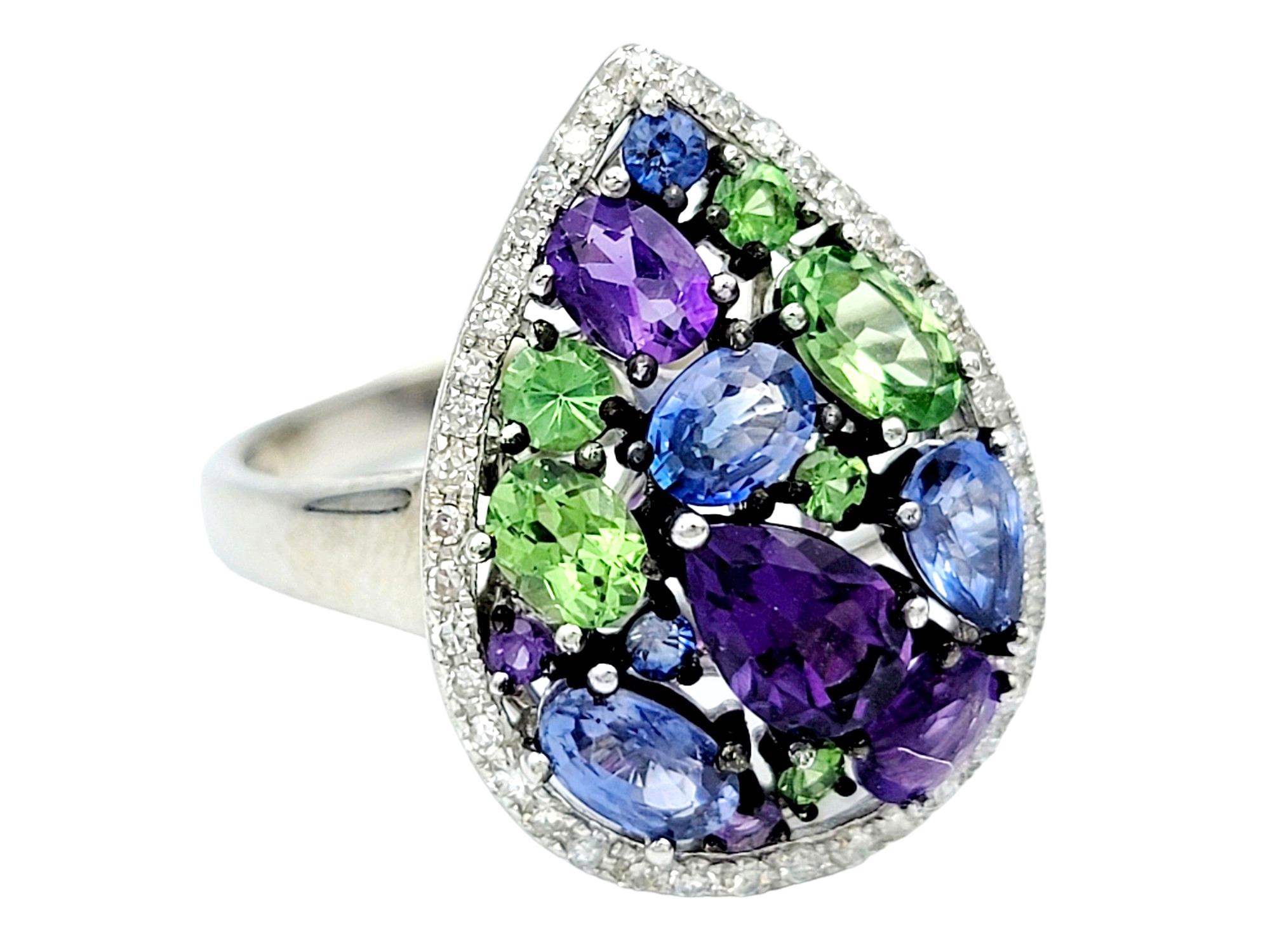Ring Size: 8.25

The Effy Watercolors pear-shaped cluster ring in 14 karat white gold is a stunning testament to artistic flair and colorful elegance. At its center, a vibrant cluster of gemstones, including amethyst, blue sapphire, and tsavorite,
