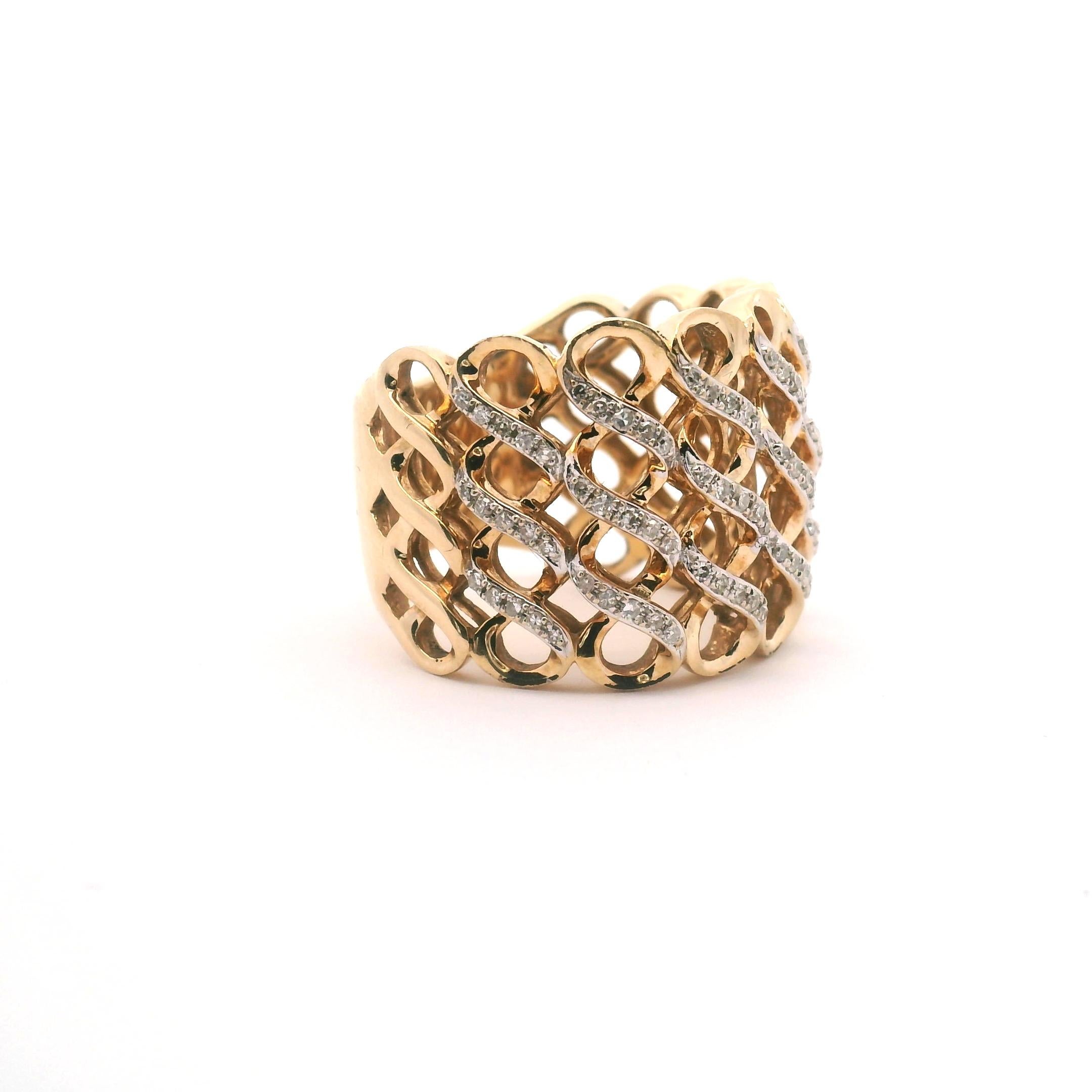 EFFY 
Lady's basket weave wide band with 21 diamonds in between each weave 

14k yellow gold 12.3 grams 


