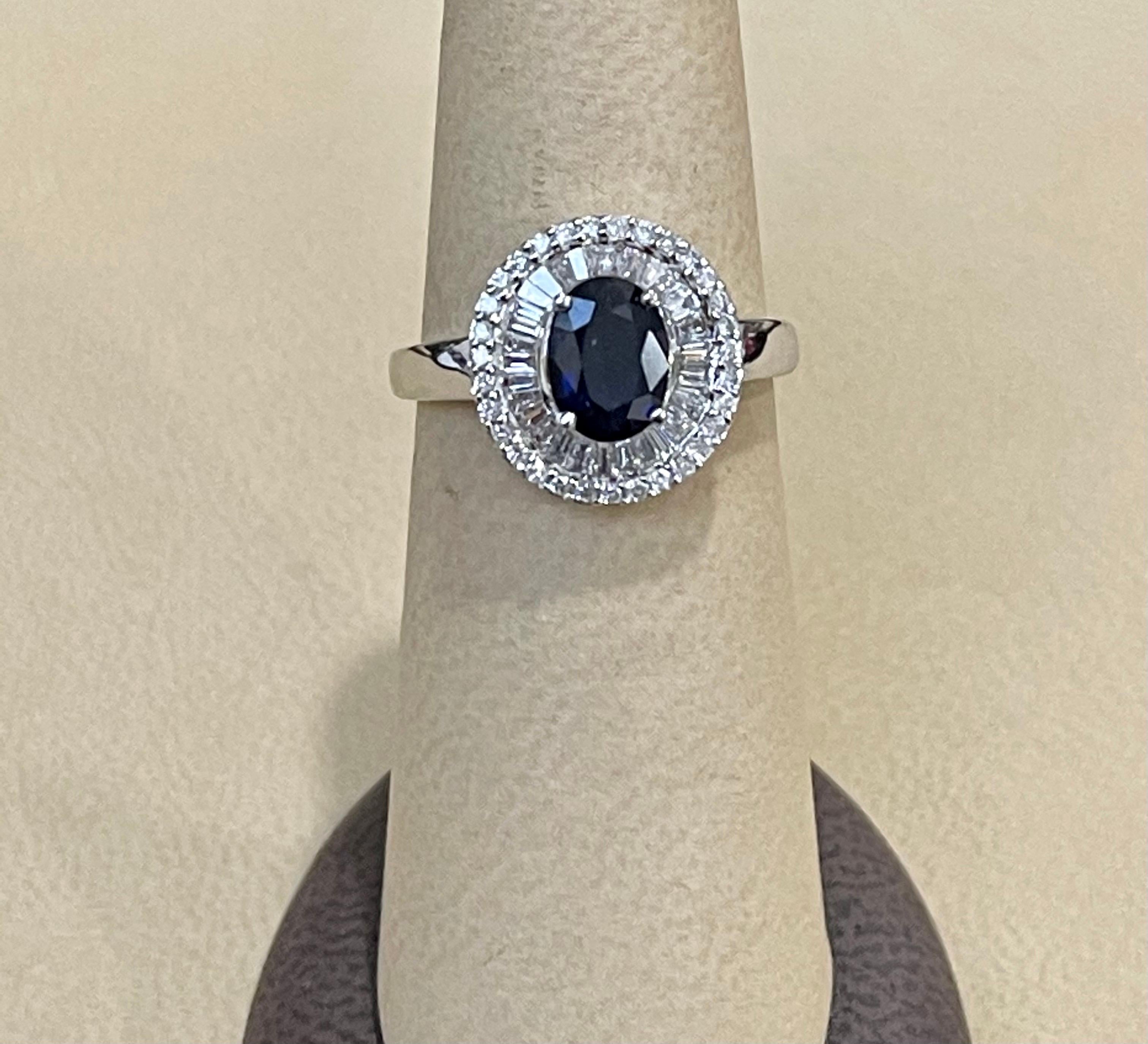 Designer Effy's 1.42 Ct Blue Sapphire & 0.52 Ct Diamond Cocktail Ring in 14 Karat White Gold
Baguettes cut diamond 65 piece 
14 Karat White Gold 4.1Grams
1.42 Ct Natural Diffused Ceylon Sapphire 
Ring Size 7  ( it can be resized to any size for free
