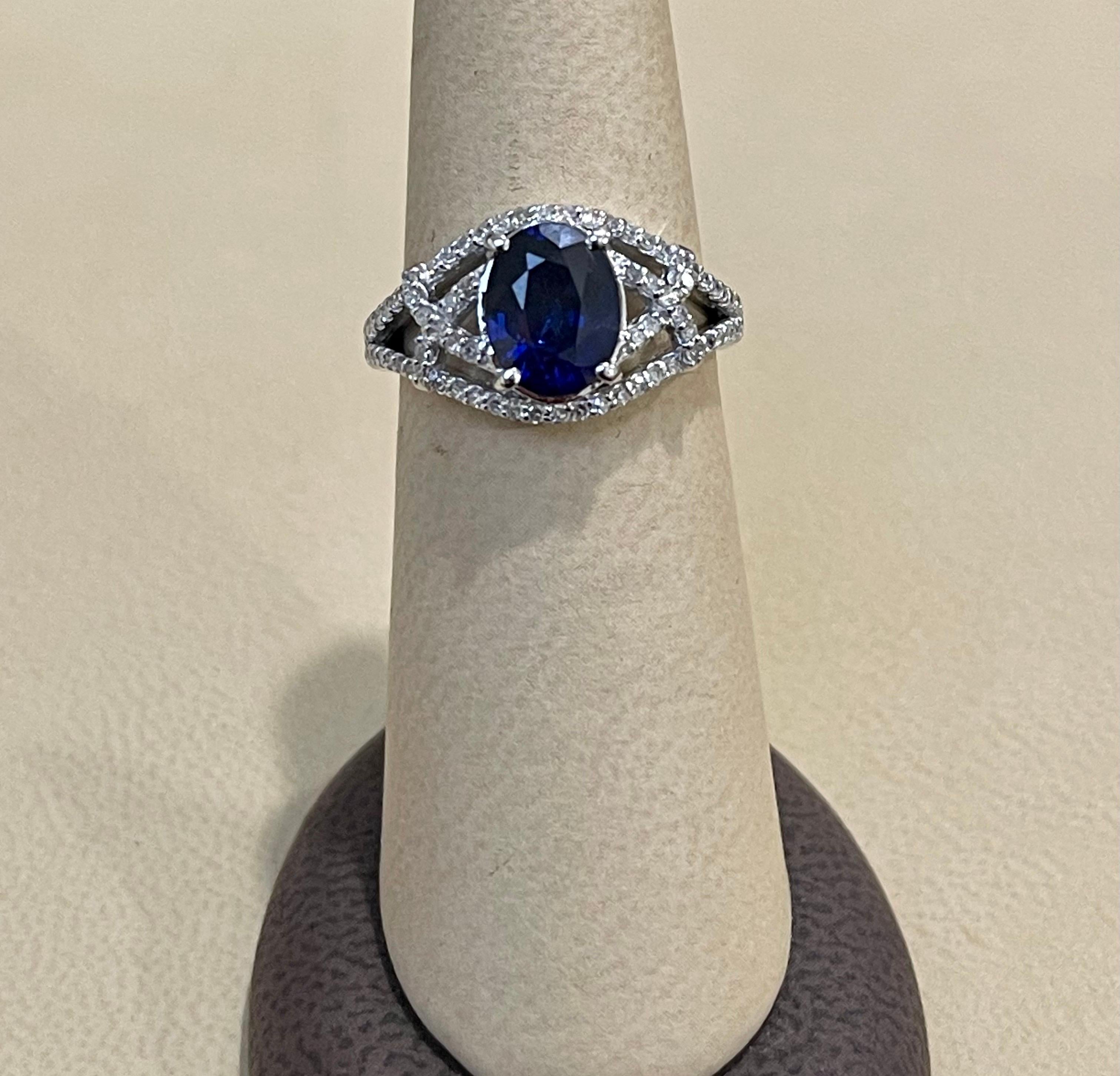Designer Effy's 1.9 Ct Blue Sapphire & 0.36Ct Diamond Cocktail Ring in 14 Karat White Gold
Brilliant cut round cut diamond 74 piece , ).5 Pointer each
14 Karat White Gold 5 Grams
1.9 Ct Natural Diffused Ceylon Sapphire 
Ring Size 7  ( it can be