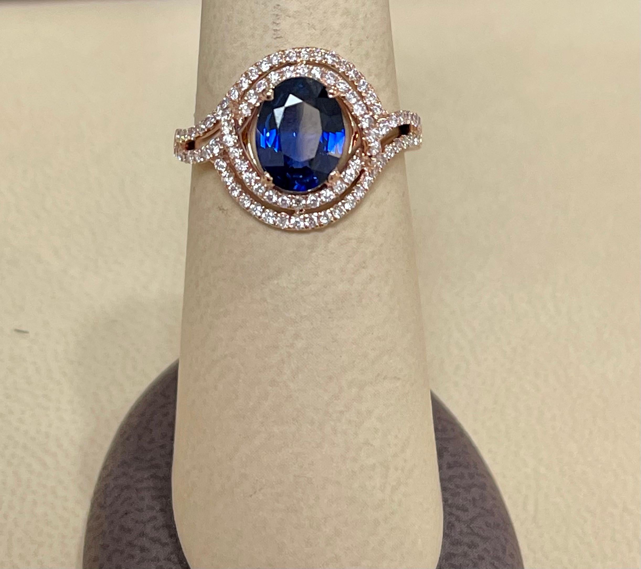 Designer Effy's 1.9Ct Blue Sapphire & 0.45 Ct Diamond Cocktail Ring in 14 Karat Rose Gold
Round Brilliant cut diamond 92 piece 0.5 pointer each
14 Karat yellow Gold 3.8 Grams
1.90 Ct Natural Diffused Ceylon Sapphire 
Ring Size 7  ( it can be resized