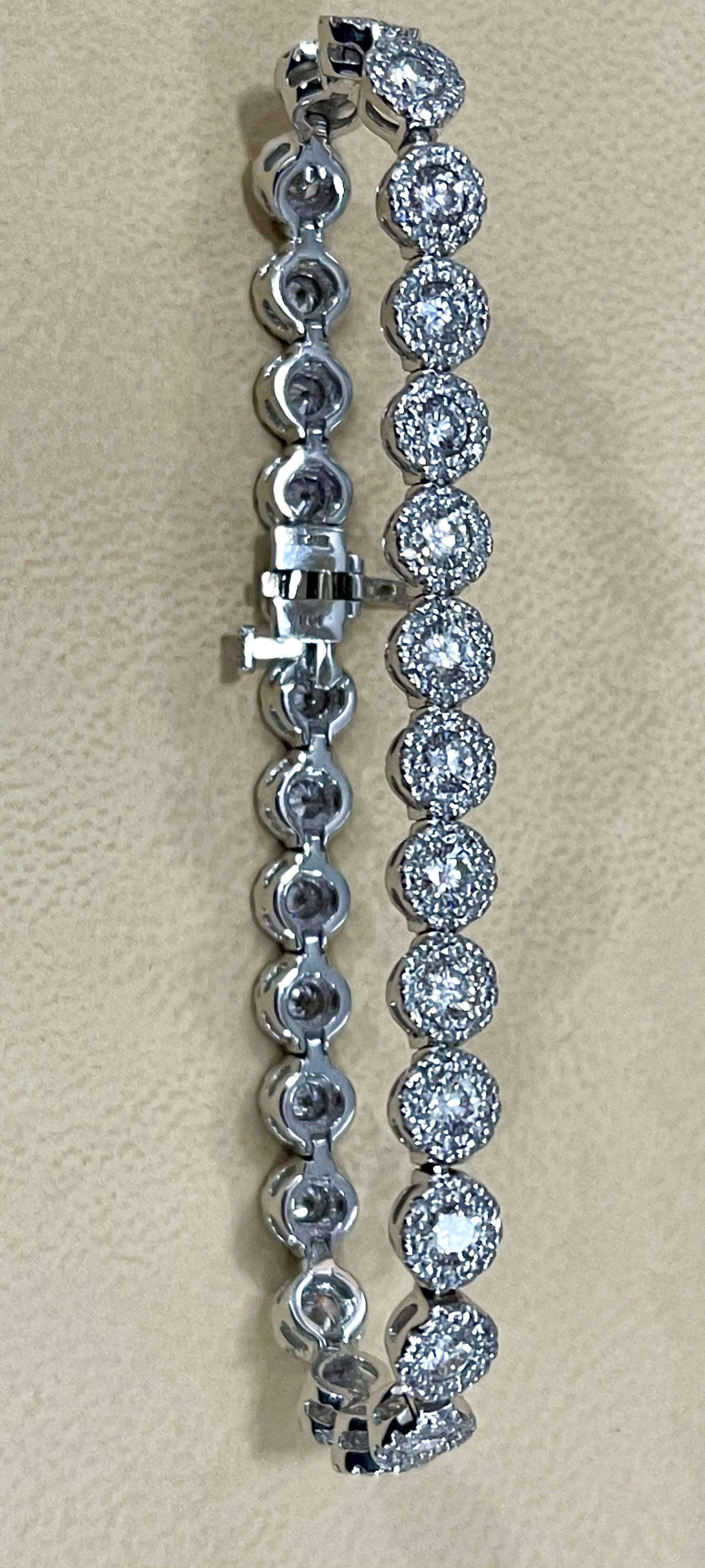 
Effy's 5.5 Ct  Basel set Diamond Line Tennis Bracelet in 14 Karat White Gold 
Meet the ultimate bold tennis bracelet. The single row of Basel set  Round Brilliant cut Diamond Surrounded by pave diamonds
Total Diamond  weighs is 5.51  carats. 
29