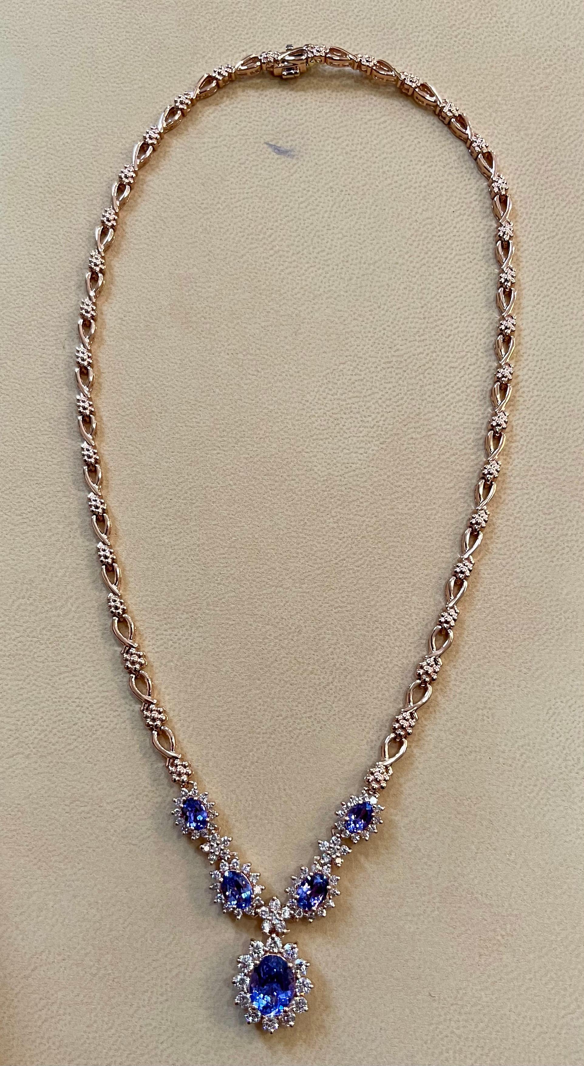 Effy's 5.5 Ct Oval Shape Natural Tanzanite  & 2.2 Ct Diamond Necklace 14K Rose Gold
 Oval shape Tanzanite  is surrounded by brilliant cut diamonds .
The Necklace is made with Brilliant   round cut diamond flowers alternating with a oval shape