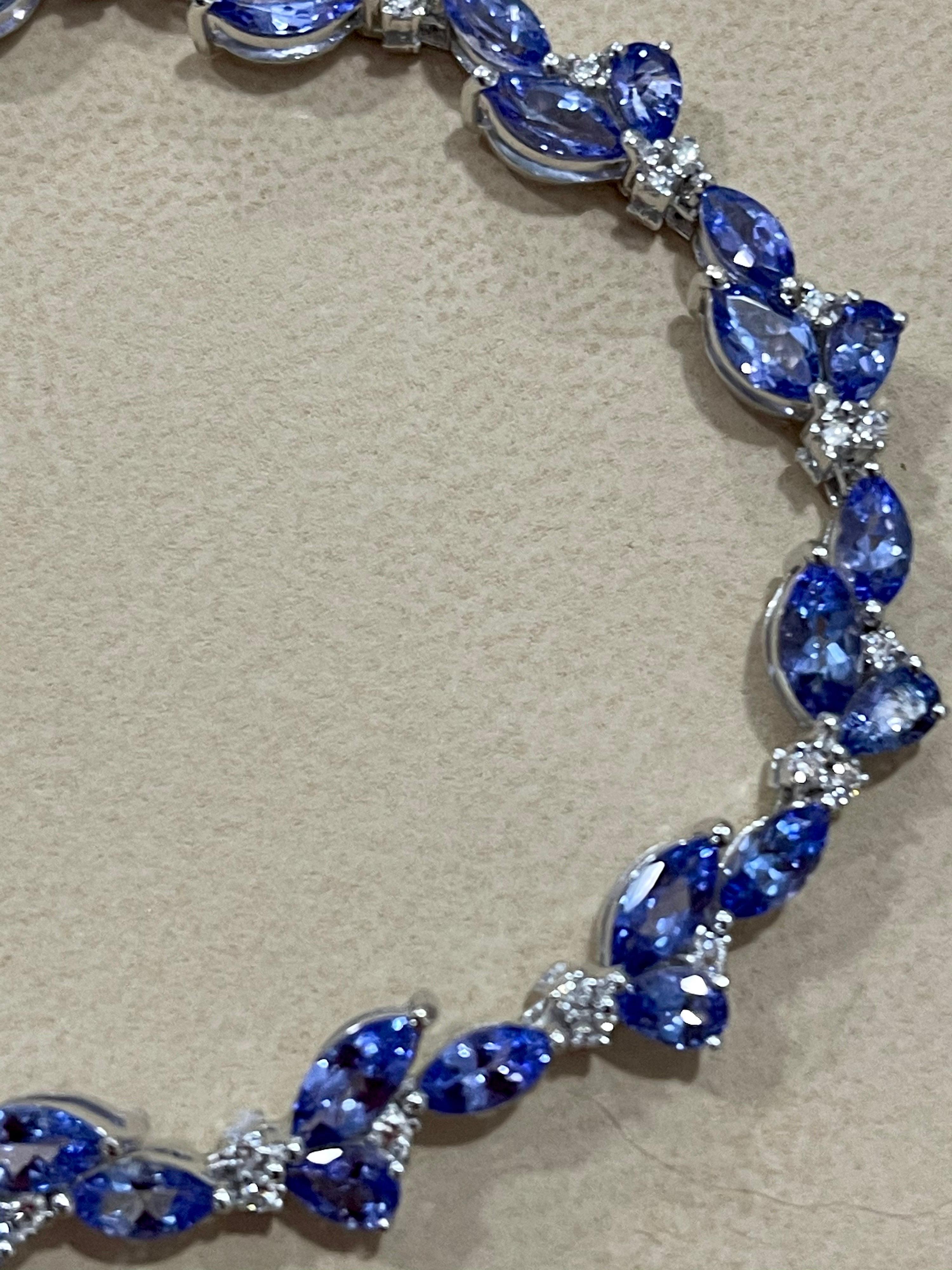  This exceptionally affordable Tennis  bracelet has  Multiple stones of  Tanzanite in Pear shape and in marquise shape  . 
 Total weight of Tanzanite  is 9.02 carat. Total number of diamonds are 39 and diamond weighs 0.5ct
The bracelet is expertly