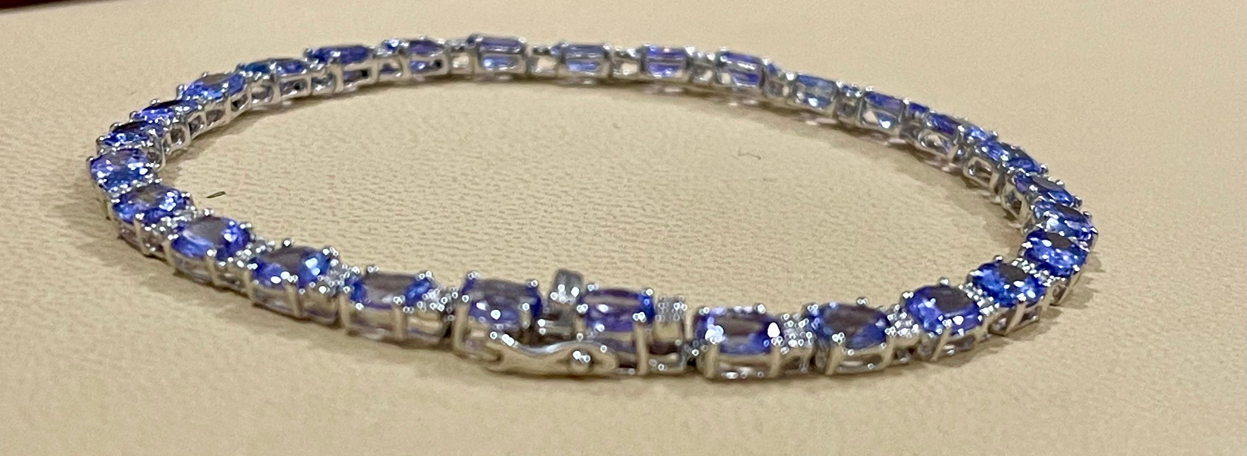  This exceptionally affordable Tennis  bracelet has  Multiple stones of  Tanzanite in Oval shape . 
 Total weight of Tanzanite  is 8.78 carat. Total number of diamonds are 54 and diamond weighs 0.25ct
The bracelet is expertly crafted with 8.5 grams