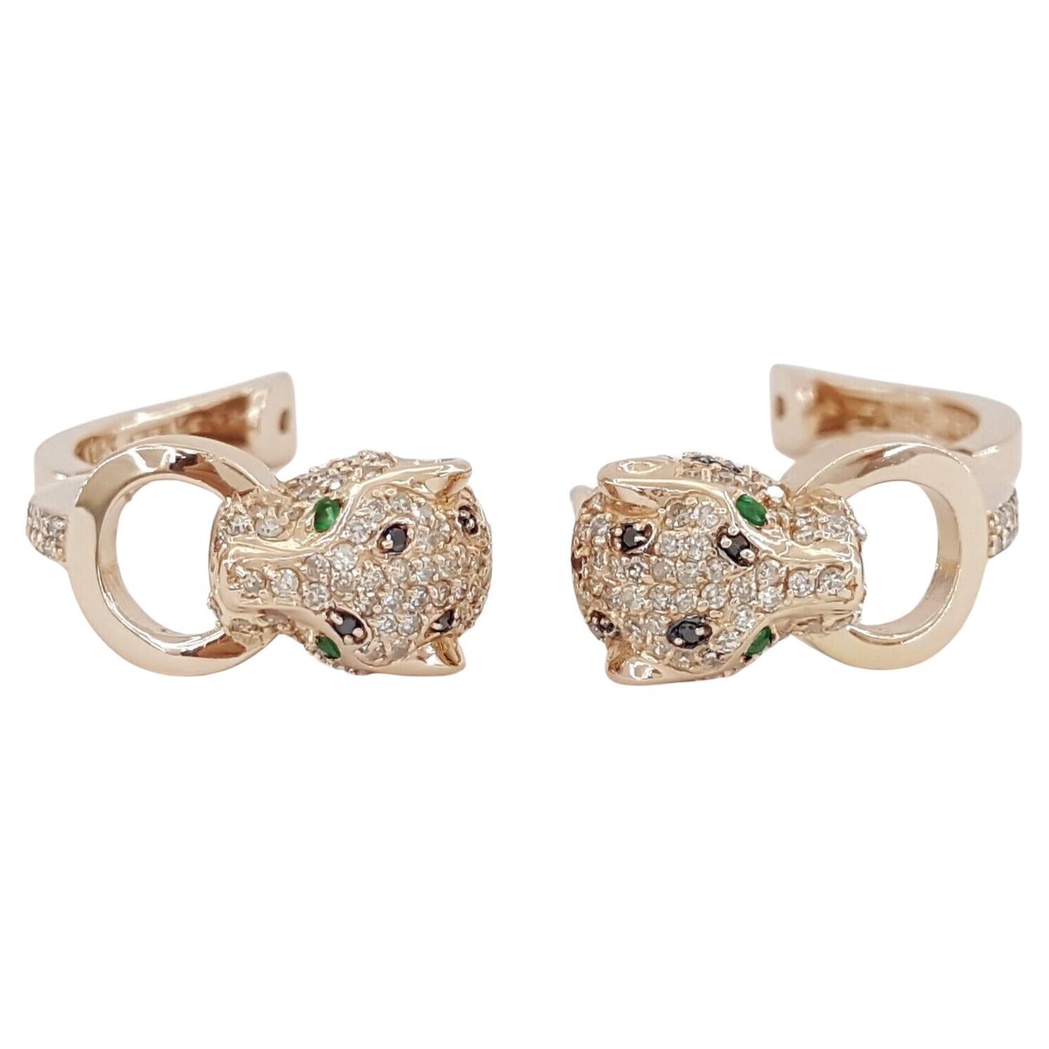 These are EFFY's distinctive Panther Hoops Earrings crafted in 14k Rose Gold, featuring a total weight of 0.89 carats of Round Cut White & Black Diamonds, complemented by vibrant Green Emerald accents. The earrings weigh 8.8 grams and showcase Round