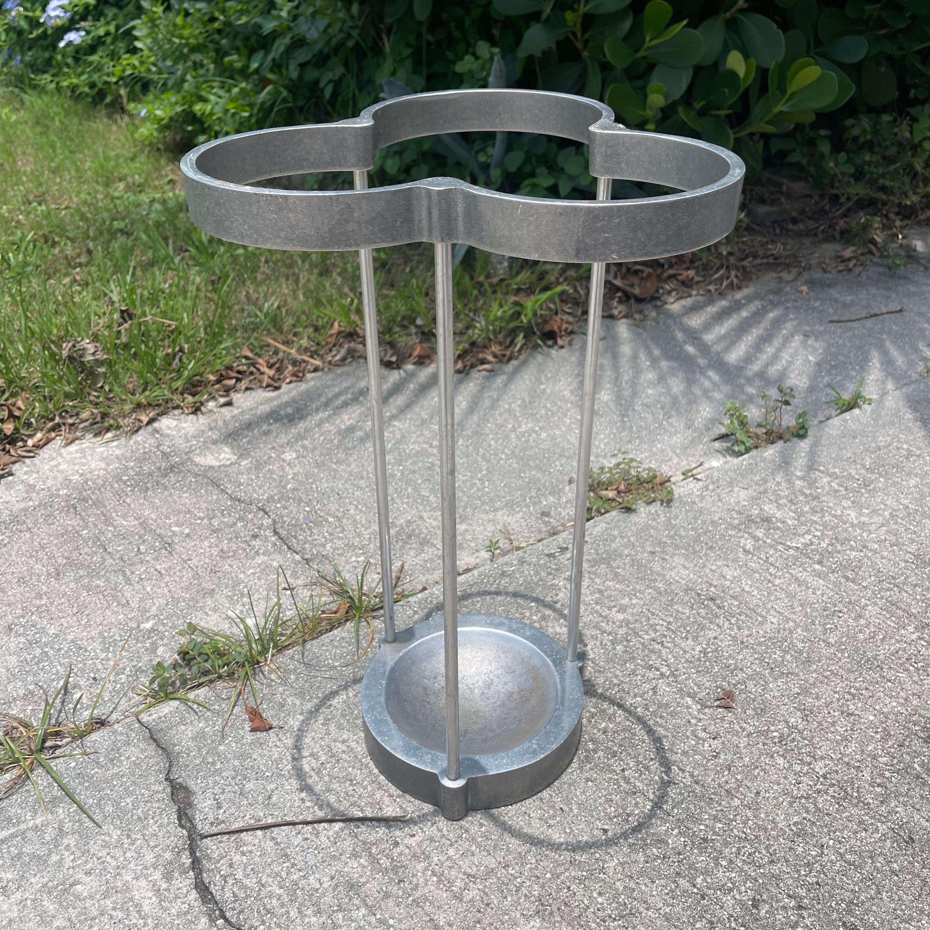 Timeless modernist designed umbrella stand made of cast aluminum.