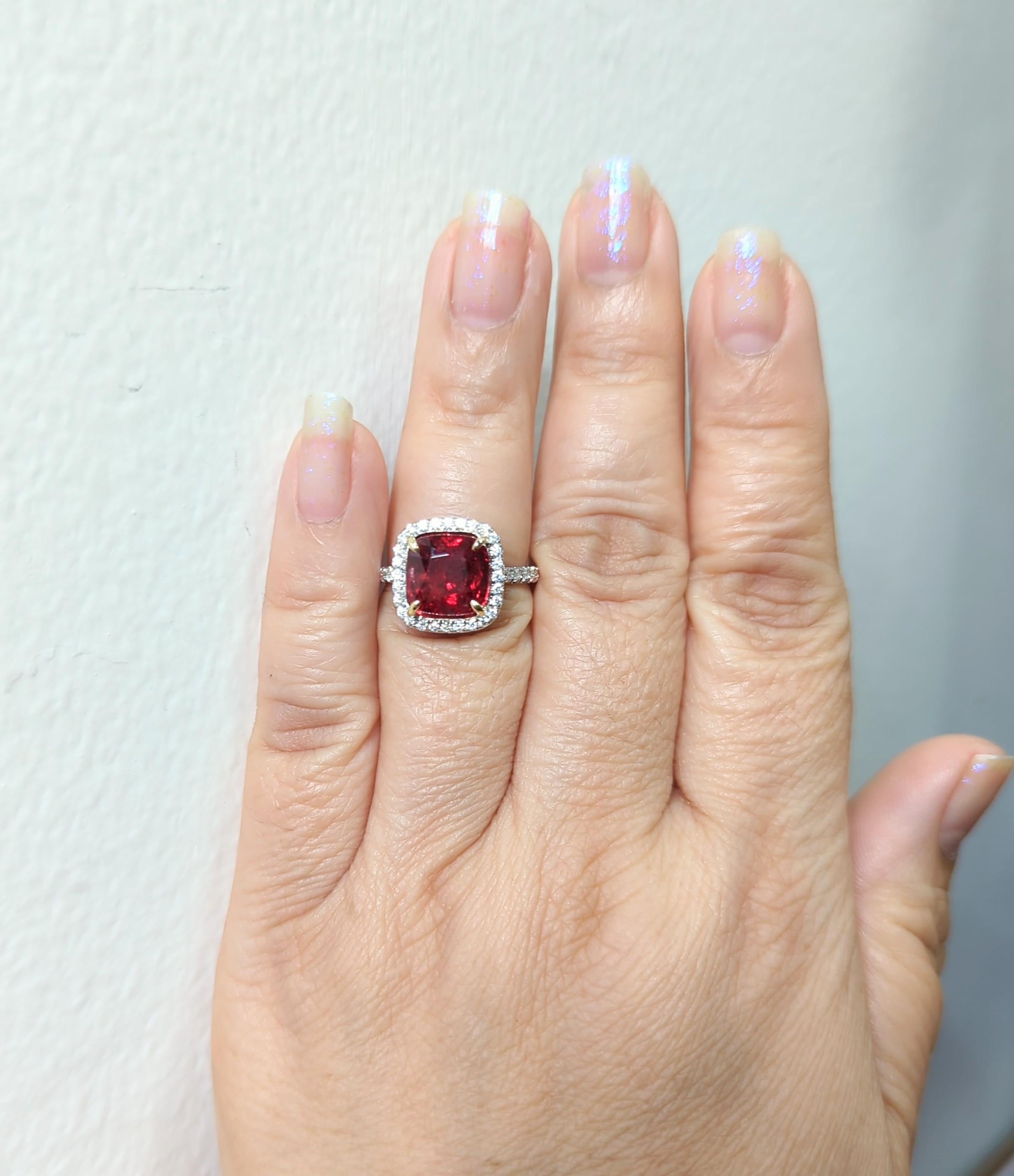 Gorgeous 5.06 ct. unheated vivid red spinel square cushion with good quality, white, and bright diamond rounds.  Handmade in 18k white and yellow gold.  EG Lab certificate included.  Ring size 6.5.