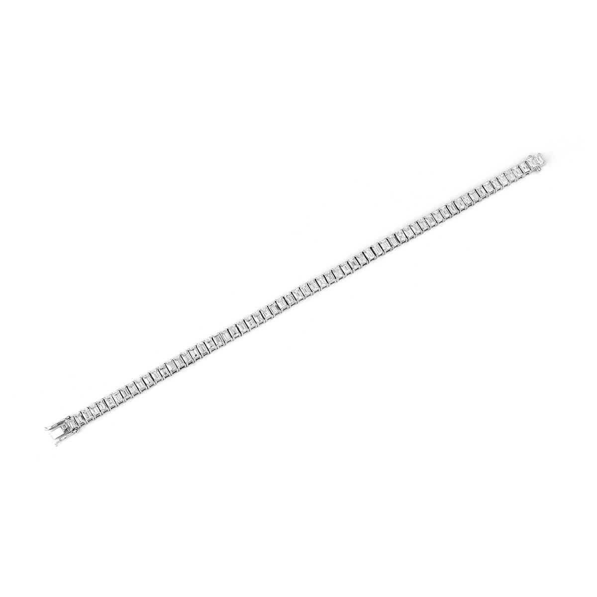 WHITE GOLD EMERALD CUT DIAMOND TENNIS BRACELET - 9.37 CT


Set in 18K White Gold


Total diamond weight: 9.37 ct
[ 62 diamonds ]
Color: G-H
Clarity: VS1

Total bracelet weight: 11.73 grams


EG Lab Certified