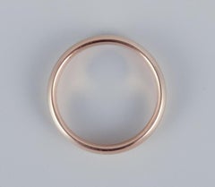 EG, Scandinavian goldsmith. 14 karat gold alliance ring. 1970s