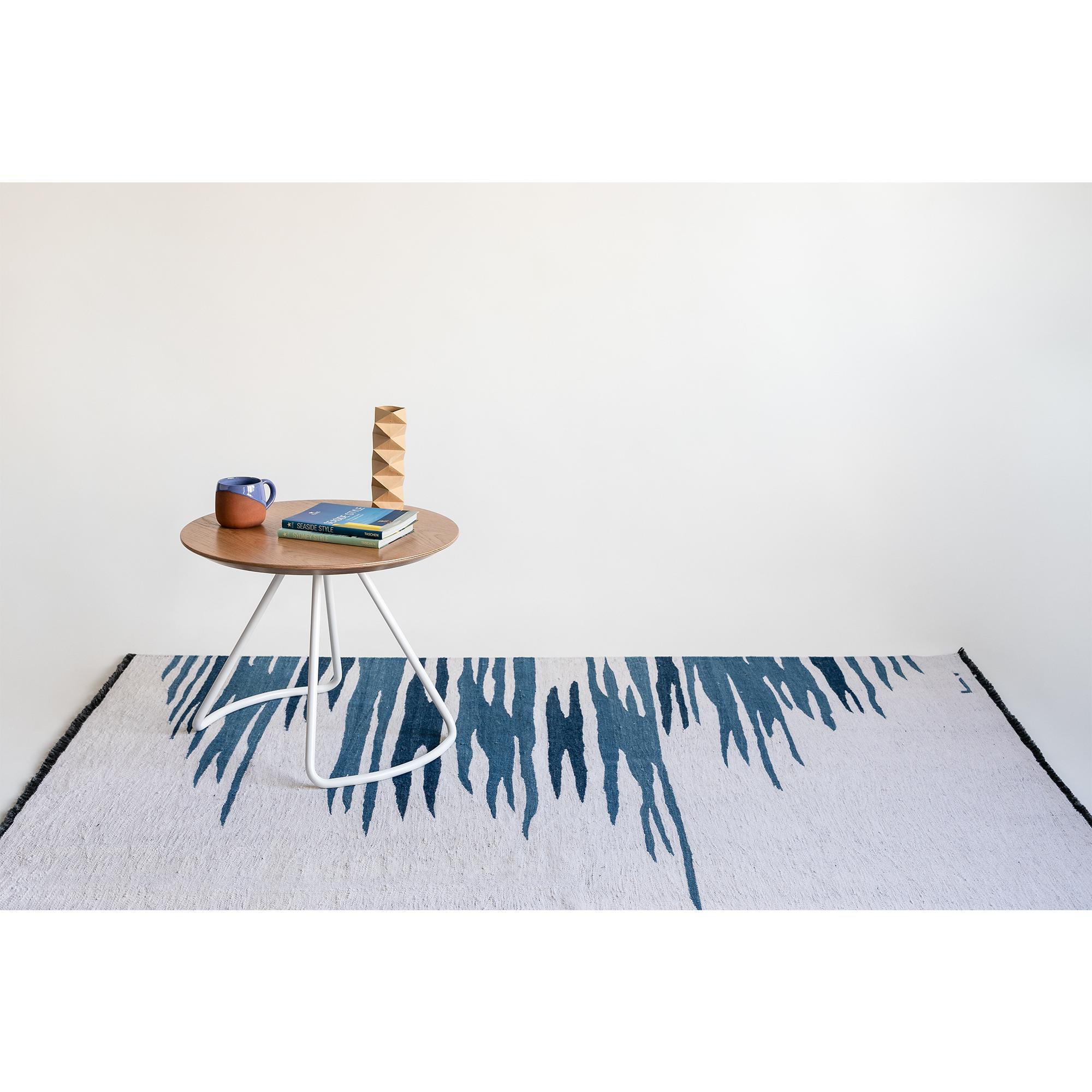 Ege No 2 kilim rug is part of a series of kilims that reflect an admiration for the visual and emotional expressiveness of the sea surface, with its fluid movements, and hues of color reflections that create a relaxing effect on the human psyche.
