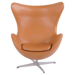 Egg Chair Model 3316 with Ottoman in Elegance Cognac Leather by Arne Jacobsen