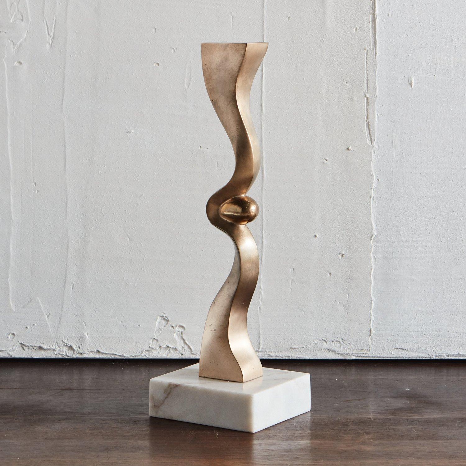The Egg Column sculpture by Chicago artist Karl Geckler. Featured here in a Satin Bronze finish and mounted on a polished cream marble base.

This piece is available standard in a Satin Bronze Finish for $2,600, with a Polished Black Granite or
