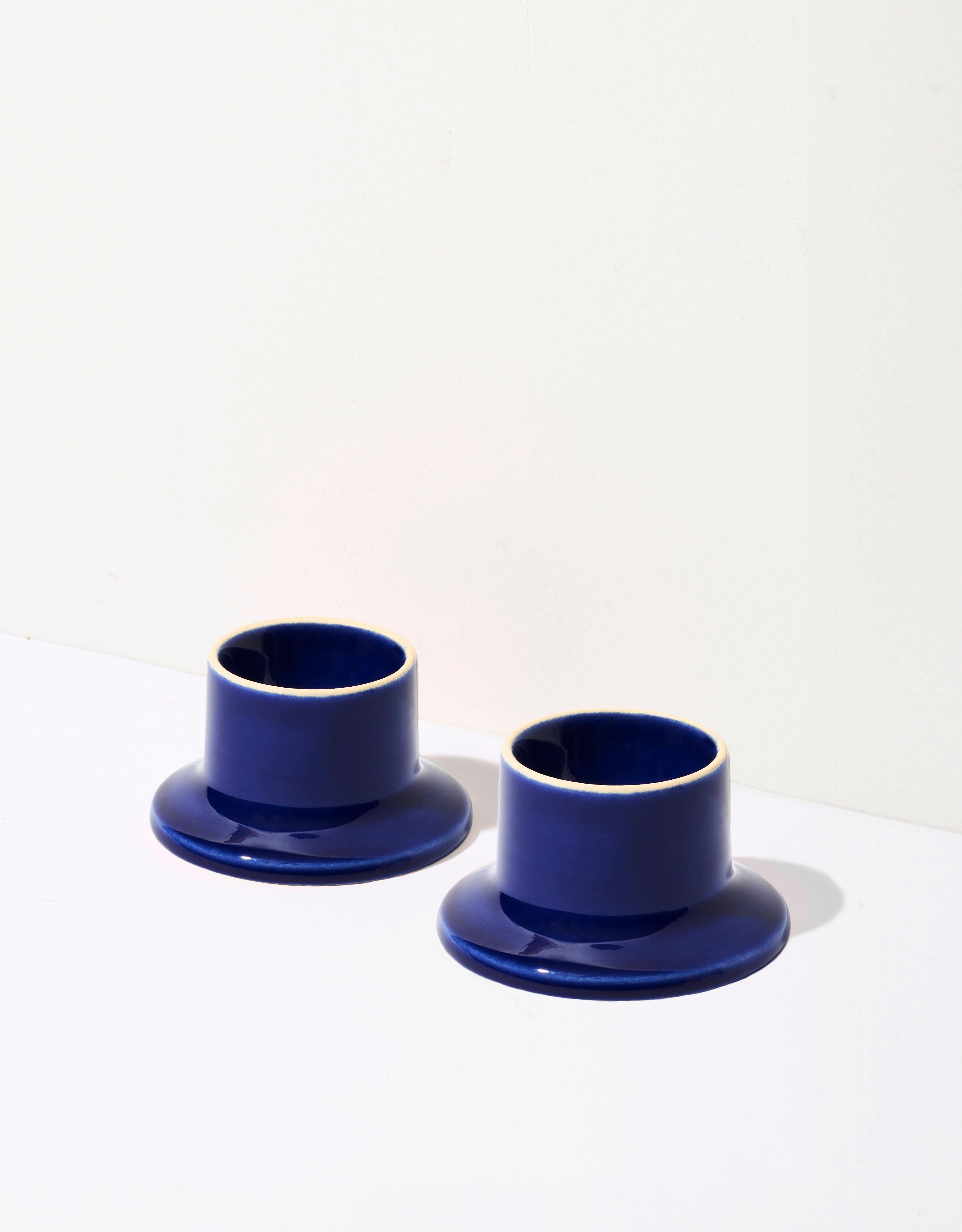 The egg holder JULA complements the OKO / Design breakfast set. This small, colorful tableware piece will brighten up any breakfast! Selling in set of two. 