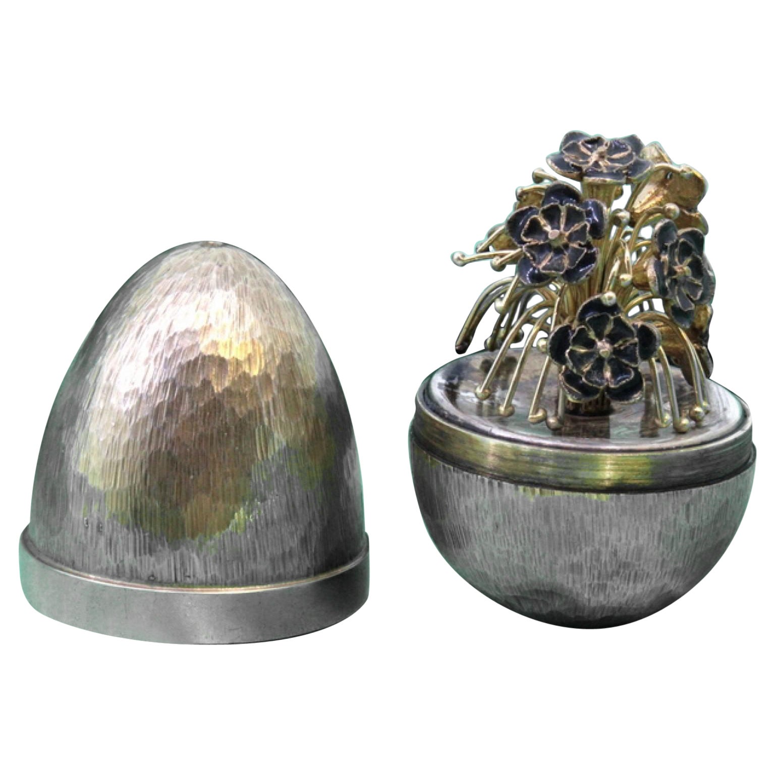 Egg in brushed gilded silver with a bouquet of flowers inside, Fabergé style