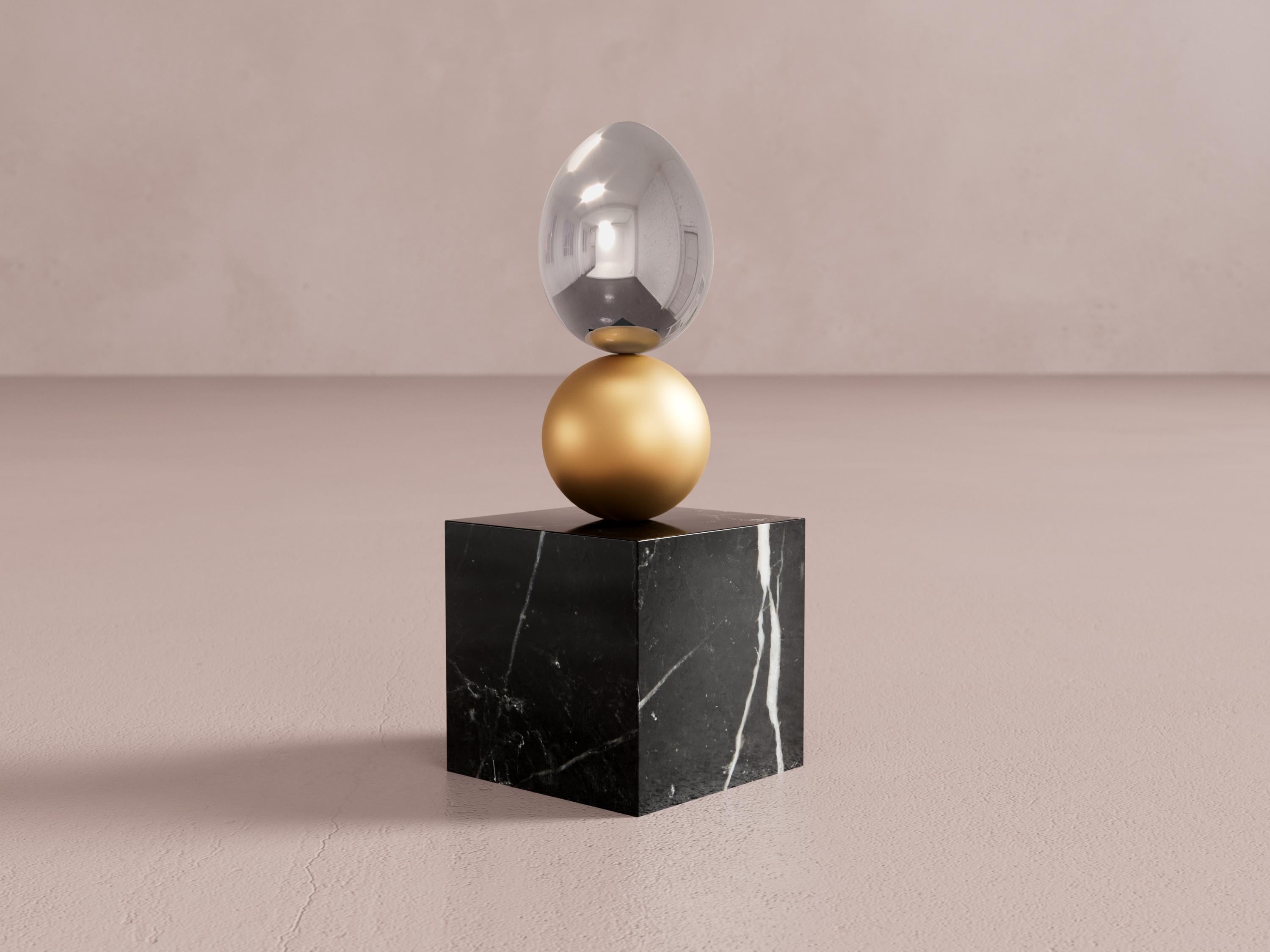 Egg of Mirror Pavillon by Pilar Zeta
Limited Edition of 10 + 2AP pieces.
Materials: stainless steel, brass and marble.
Dimensions: W 48 x D 48 x H 120 cm.
Weight: 100 kg.

Egg sculpture. Stainless steel, brass and marble.

Argentinian-born
