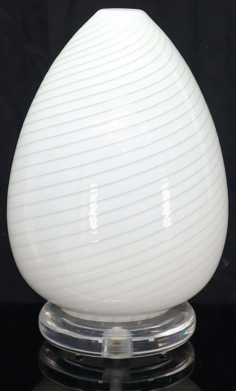 Mid-Century Modern swirl milk glass pattern egg shape Murano glass table lamp.