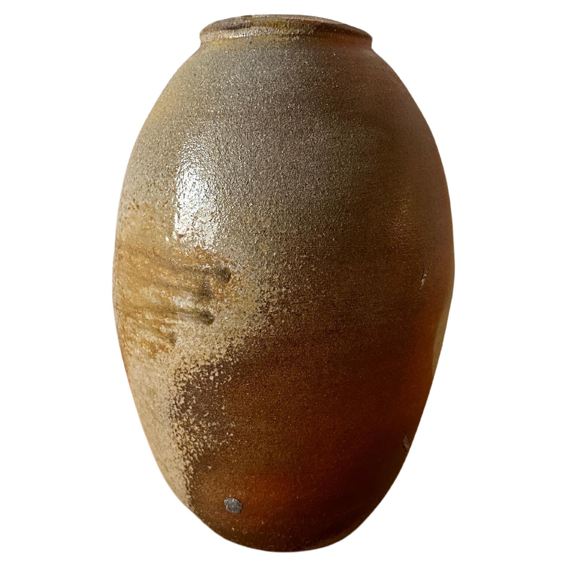 Egg shaped ceramic vase
