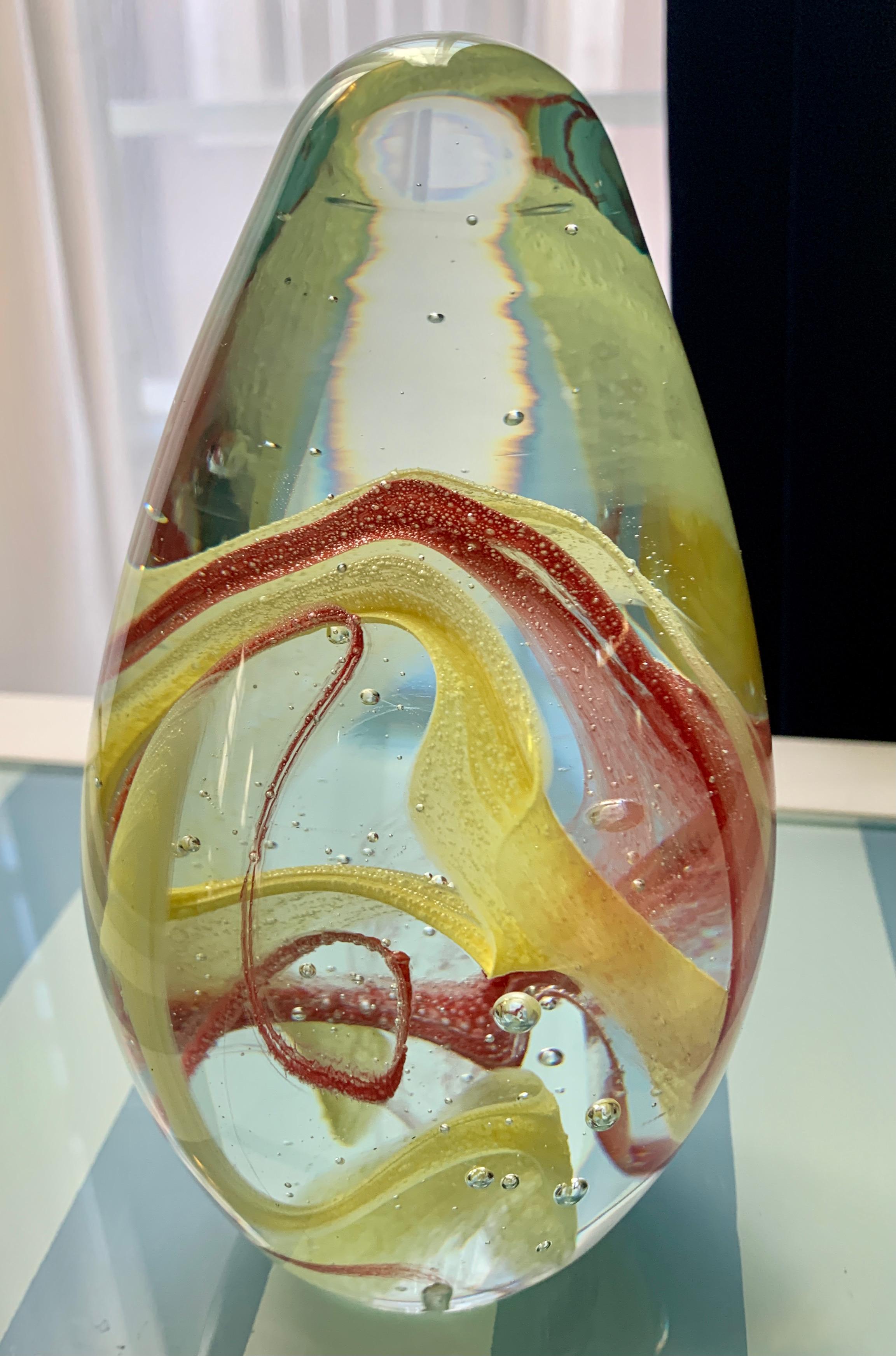 ecea wonderful deciorative or practical piece - the Clear glass with red and yellow ribbons are wonderful in it's tall size - hand crafted in Italy. nice Housewarming or Christmas holiday gift.