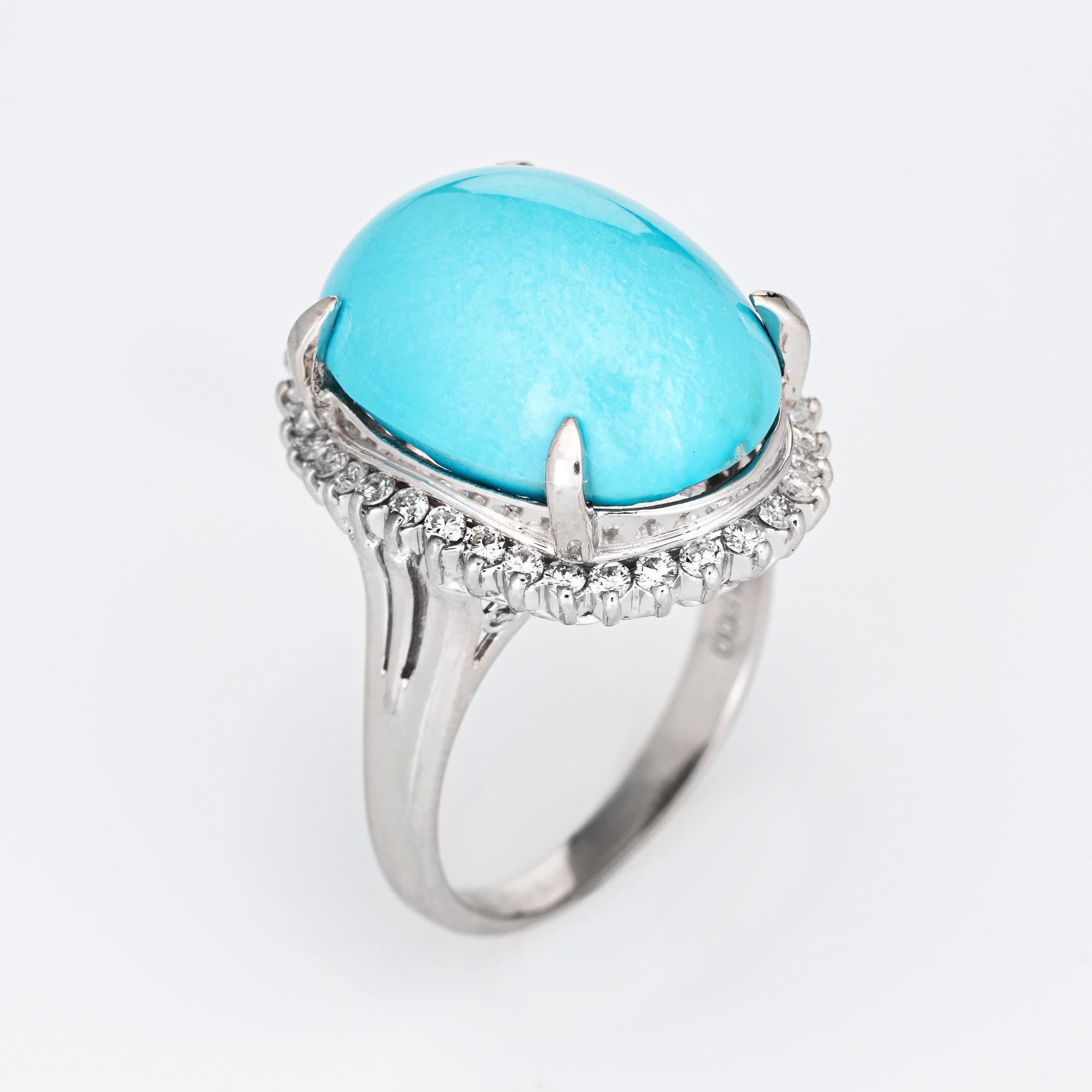 Stylish egg shell blue turquoise & diamond cocktail ring crafted in 900 platinum. 

Turquoise cabochon measures 18mm x 13mm (estimated at 15 carats) is accented with an estimated 0.42 carats (estimated at H-I color and VS2-SI1 clarity). The