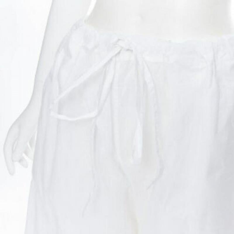 EGG TRADING 100% cotton extreme oversized drawstring waist drop croch pants S
Reference: LNKO/A01459
Brand: Egg Trading
Material: Cotton
Color: White
Pattern: Solid
Closure: Drawstring
Extra Details: Drawstring waistband. Dropped crotch.


Made in: