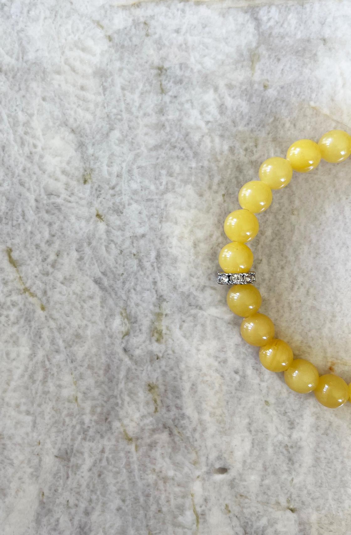 Egg Yolk Baltic Amber and Swarovski Crystal 8mm Round Beaded Stretch Bracelet In New Condition For Sale In Tucson, AZ