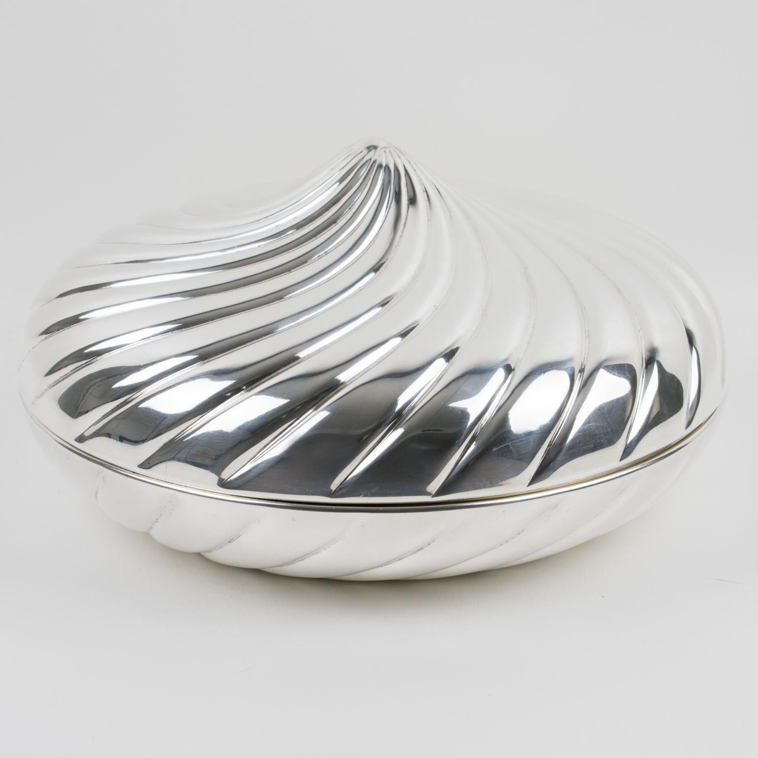 This is a fantastic silver plate decorative box created by Italian designer Egidio Broggi, Milano. The rare piece was crafted in Italy circa 1980. This impressive box features an oversized, round shape with a swirled design reminiscent of a giant