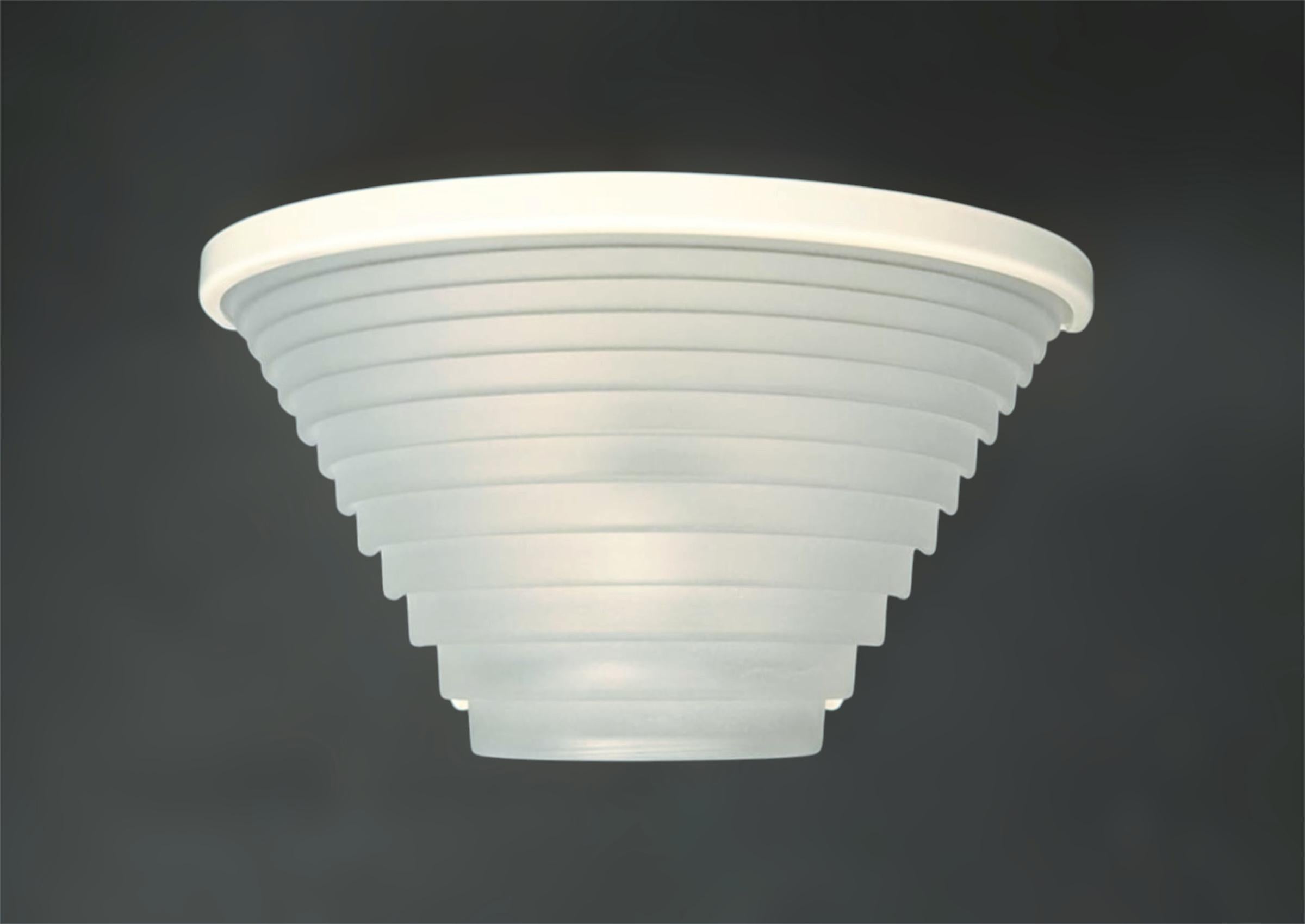 Italian vintage wall light with white sanded glass shade on painted metal frame / designed by Angelo Mangiarotti for Artemide, circa 1980s / Made in Italy
Original label on the frame
Measures: Width 11 inches, height 6 inches, depth 6 inches 
1