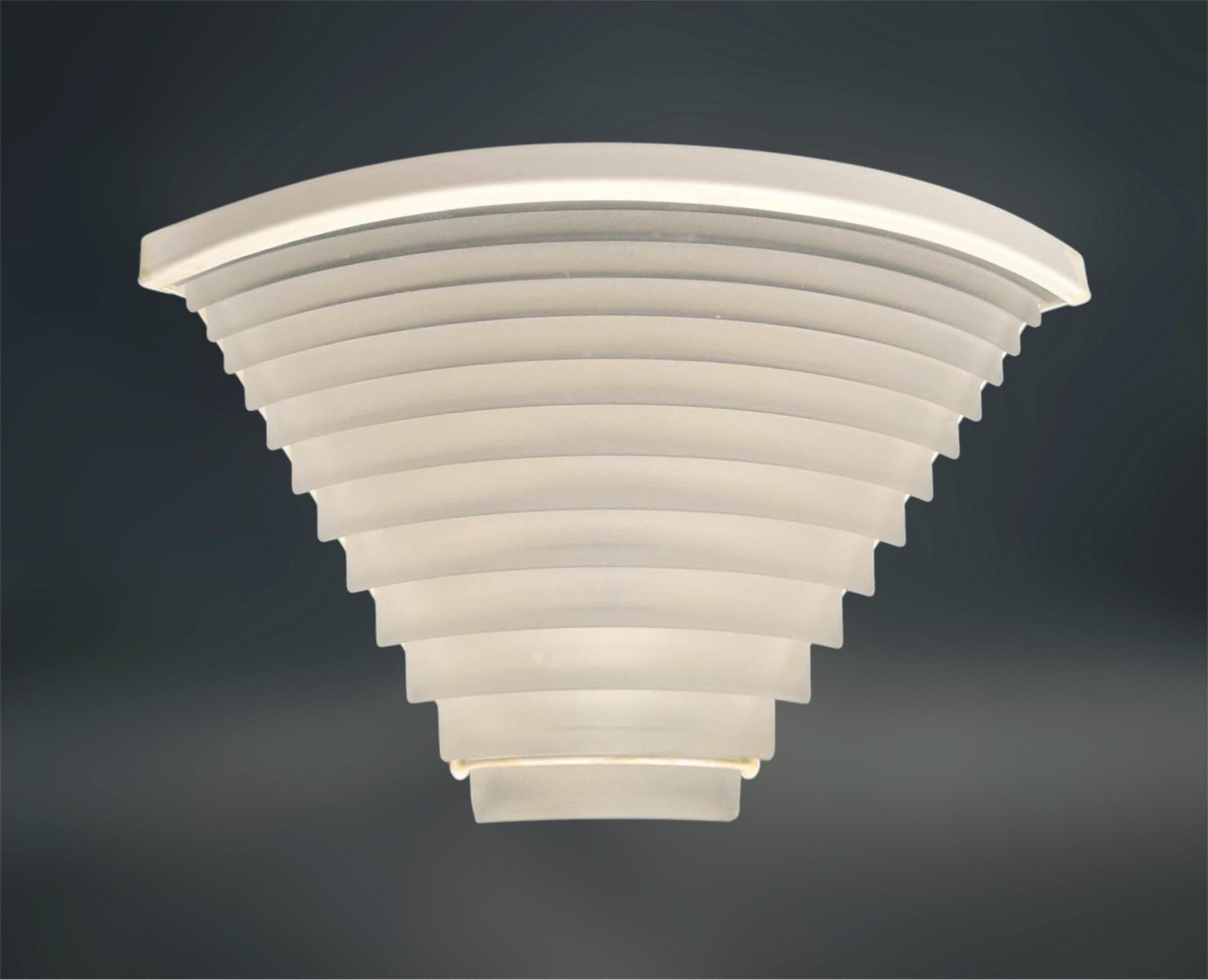 Italian vintage corner wall light with white sanded glass shade on painted angular metal frame / designed by Angelo Mangiarotti for Artemide, circa 1980s / Made in Italy
Original label on the frame
Measures: Width 11 inches, height 6 inches, depth