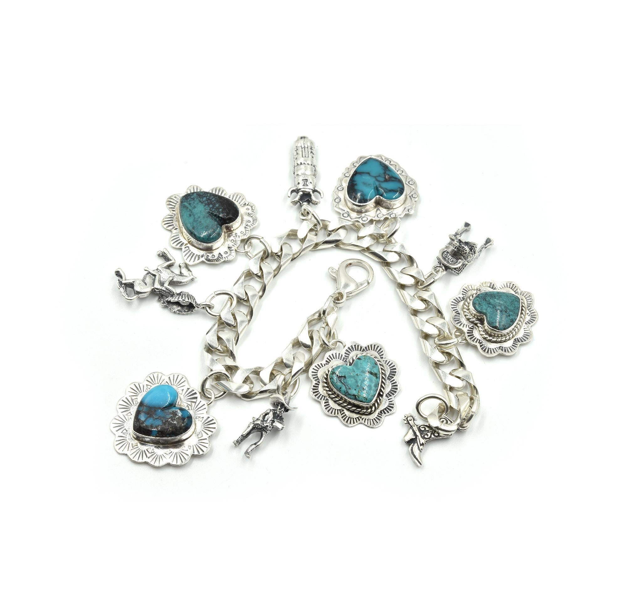 Designer: EGK Jewelry
Material: sterling silver
Gemstones: heart shaped turquoise
Dimensions: bracelet is seven inches long and 3/8 inches wide, each charm measures one inch long and one inch wide
Weight: 54.21 grams
