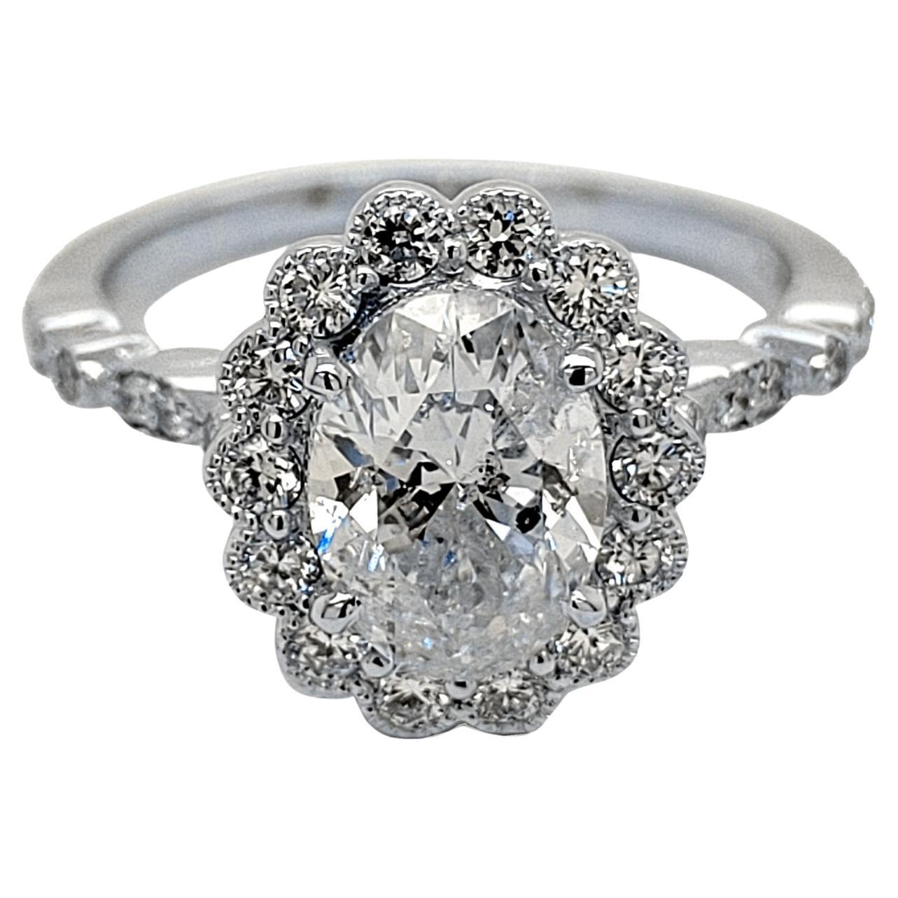EGL 1.51 Carat E/I1 Oval Diamond Pave Set Engagement Ring with Halo
