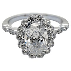 EGL 1.51 Carat E/I1 Oval Diamond Pave Set Engagement Ring with Halo
