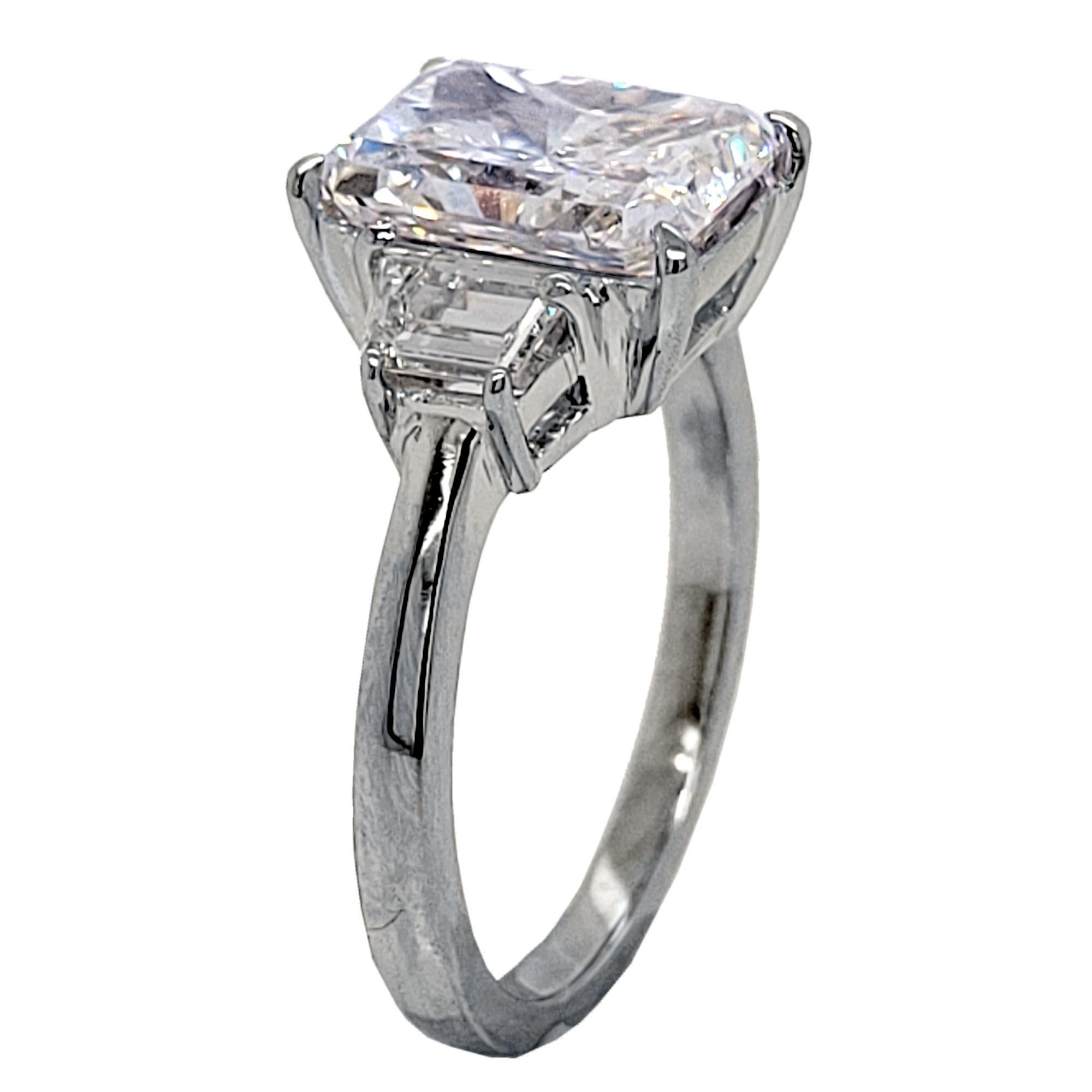 Contemporary EGL 3.02 Ct H/VS2 Radiant Diamond Platinum 3-Stone Engagement Ring w. 2 Traps For Sale