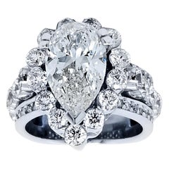 EGL 3.04 Carat G/SI3 Pear Shape Diamond 18 Karat Engagement Ring with Halo