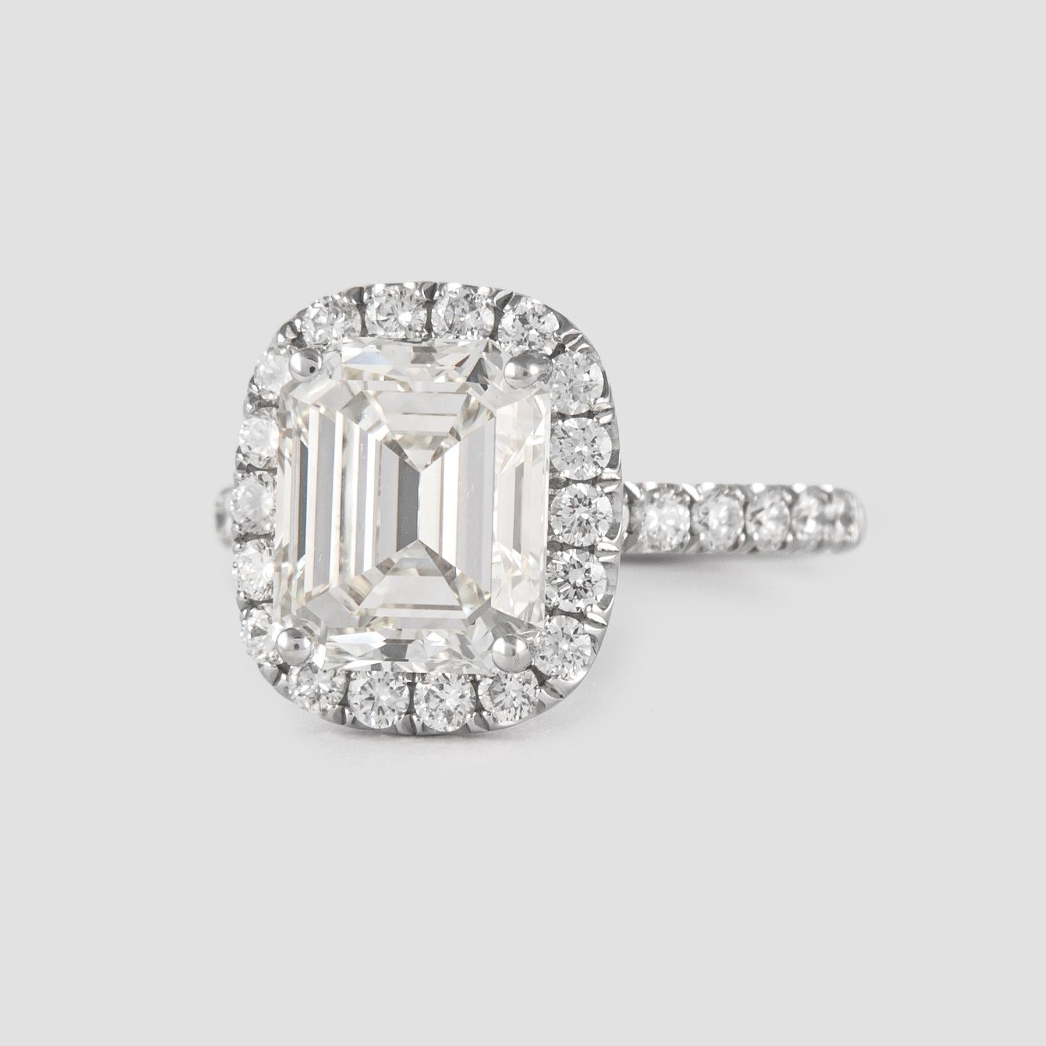 Contemporary EGL 3.99 Carat Emerald Cut Diamond Ring with an Eternity Band 18k White Gold