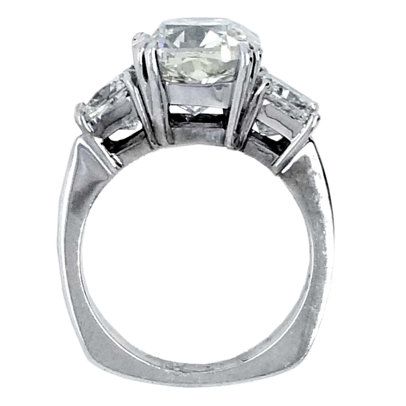 3 stone engagement ring cushion cut