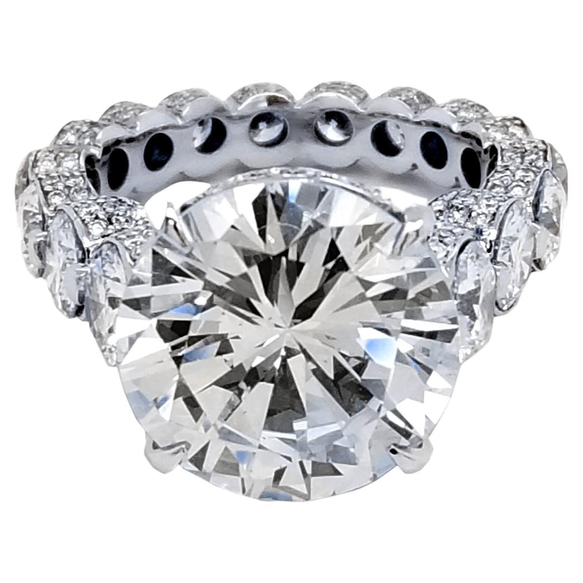 A Beautiful shiny Round Brilliant H/SI1 EGL certified center Diamond set in a fine 18k gold Eternity style Engagement Ring with Pave set diamonds all over and Shared Prong set Rounds on the shank. Total diamond weight of 4.16 Ct.  on the side. Total