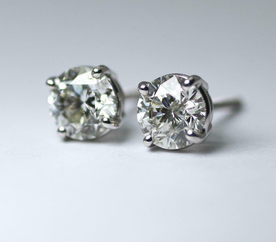 
SPECIFICATIONS:
MAIN STONE:ROUND 6.30-6.27 X 4.05
DIAMONDS: 2 
CARAT TOTAL WEIGHT: 2.07cts.
COLOR:G/H
CLARITY:SI3
METAL:14K WHITE GOLD
TYPE:STUD EARRINGS
WEIGHT:1.55 GR
